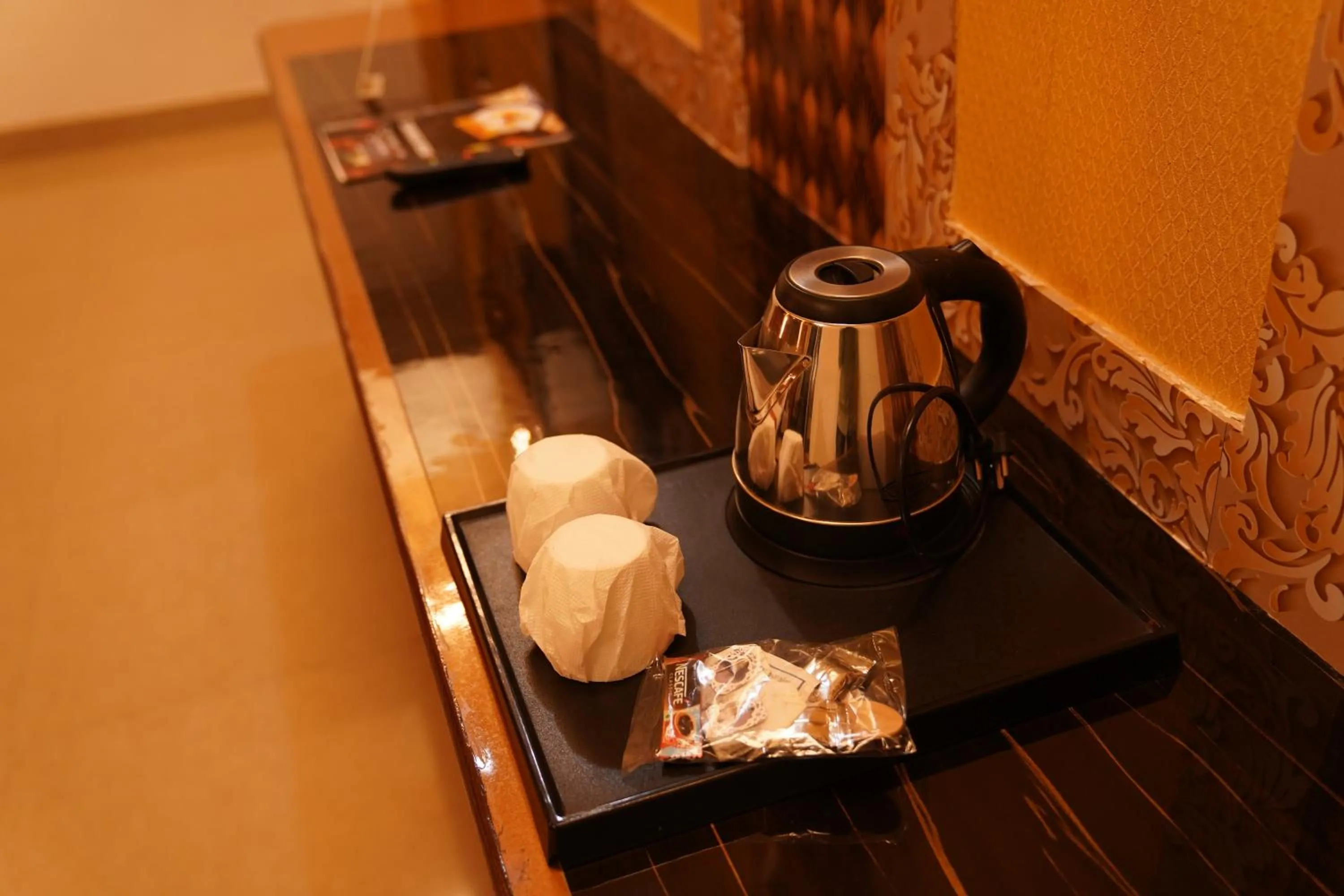 Coffee/tea facilities in Hotel Omni Plaza