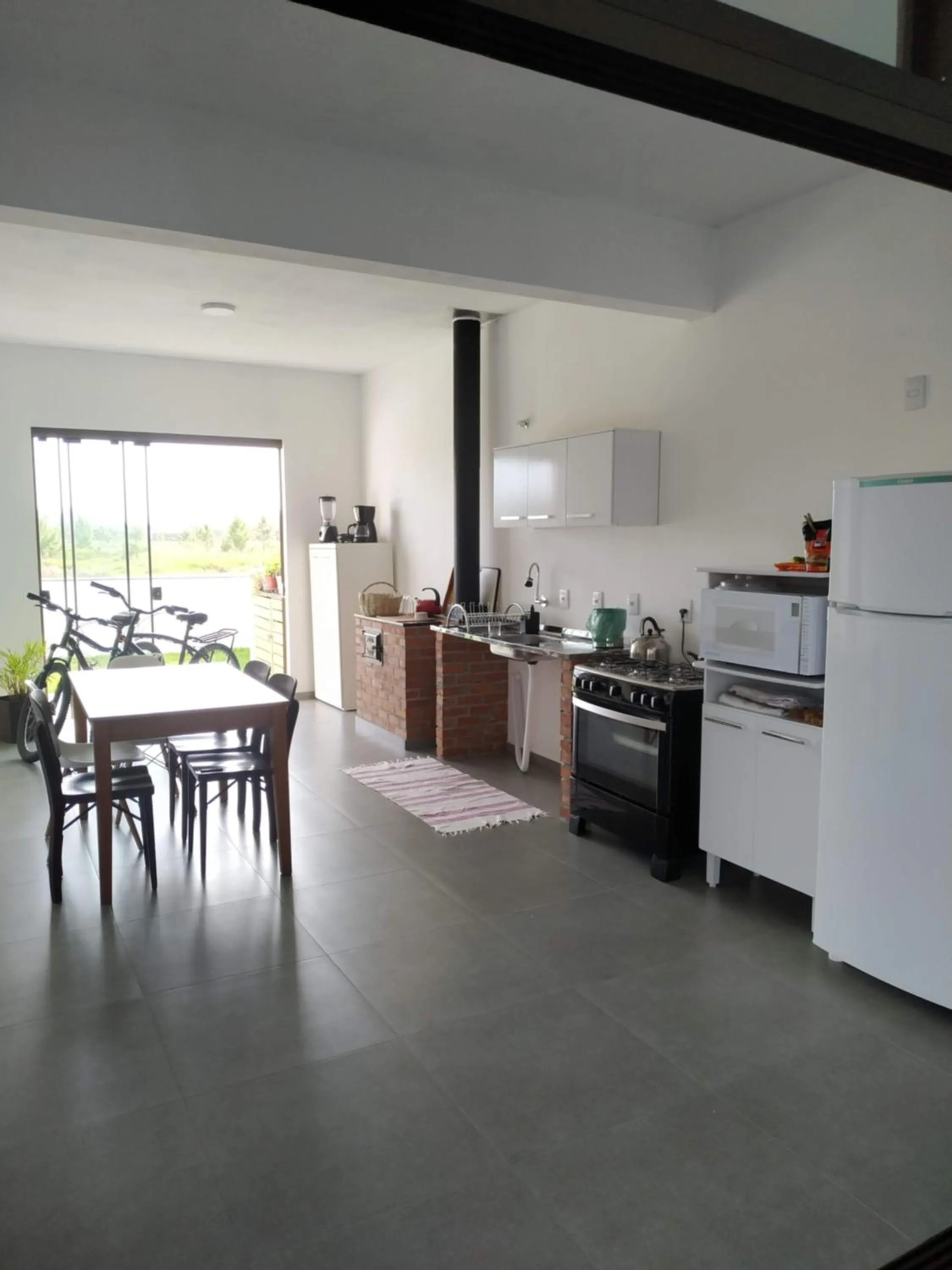 Kitchen or kitchenette in Bella Ciao Hospedaria