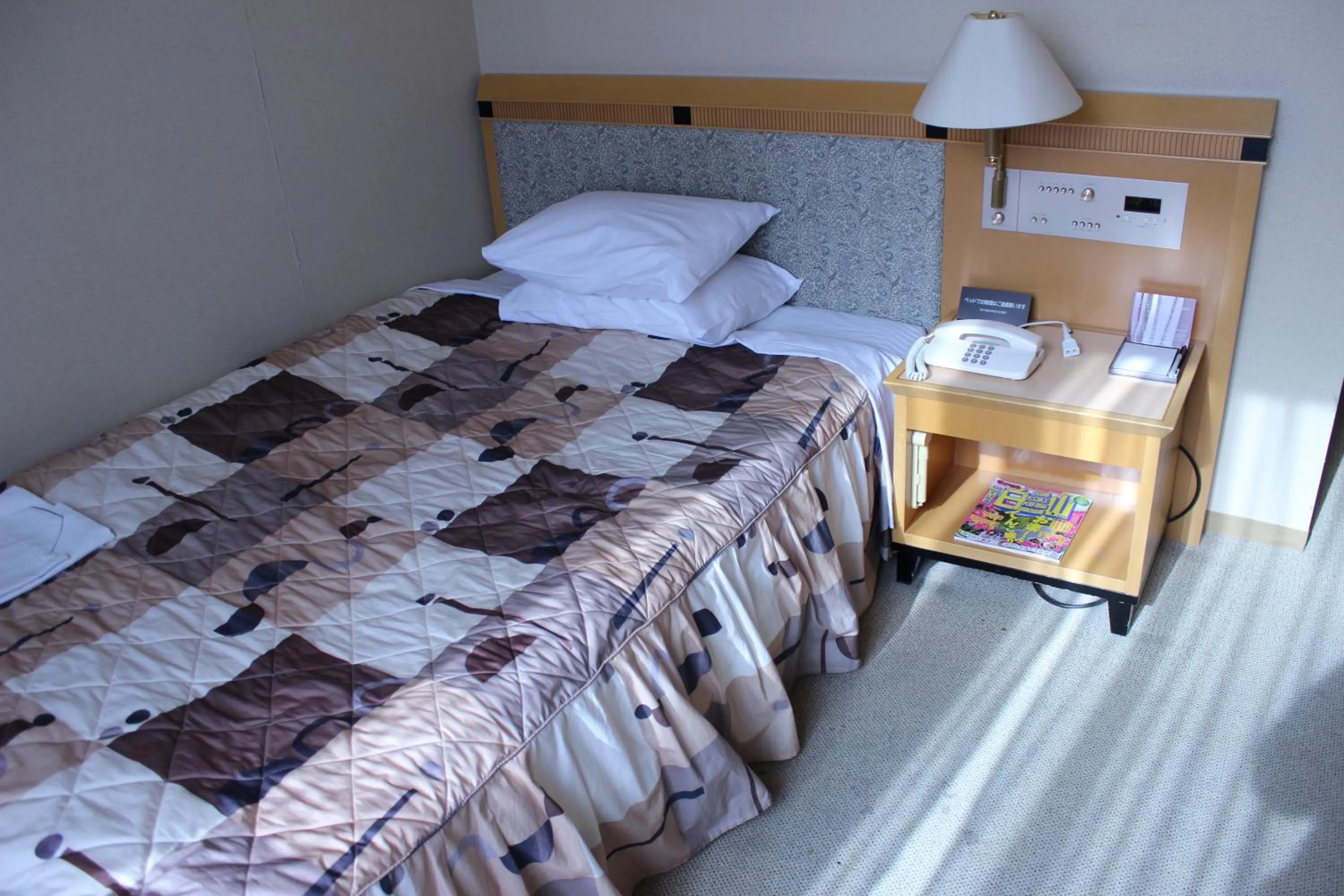 Bed in Grand Hotel Hakusan