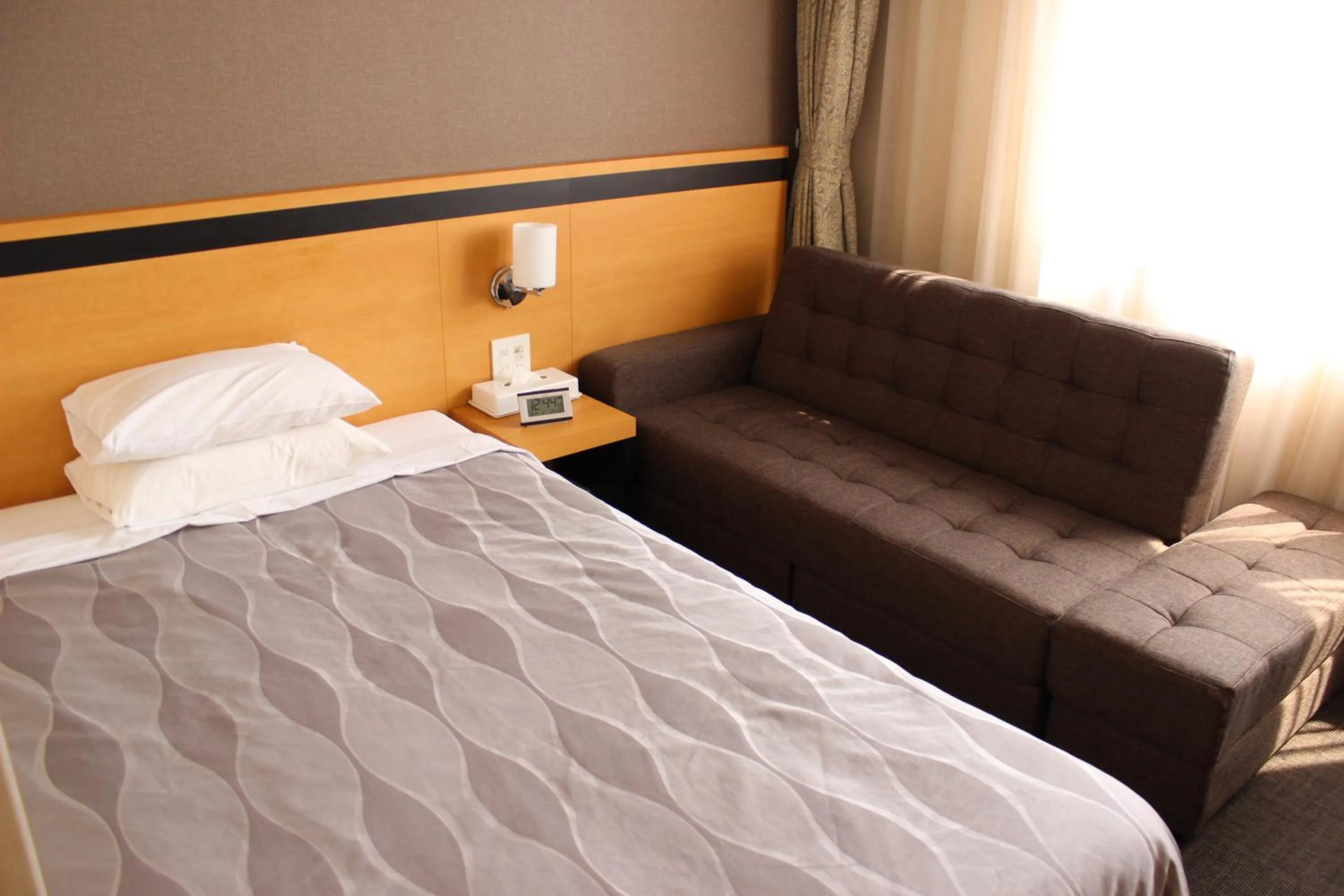 Bed in Grand Hotel Hakusan