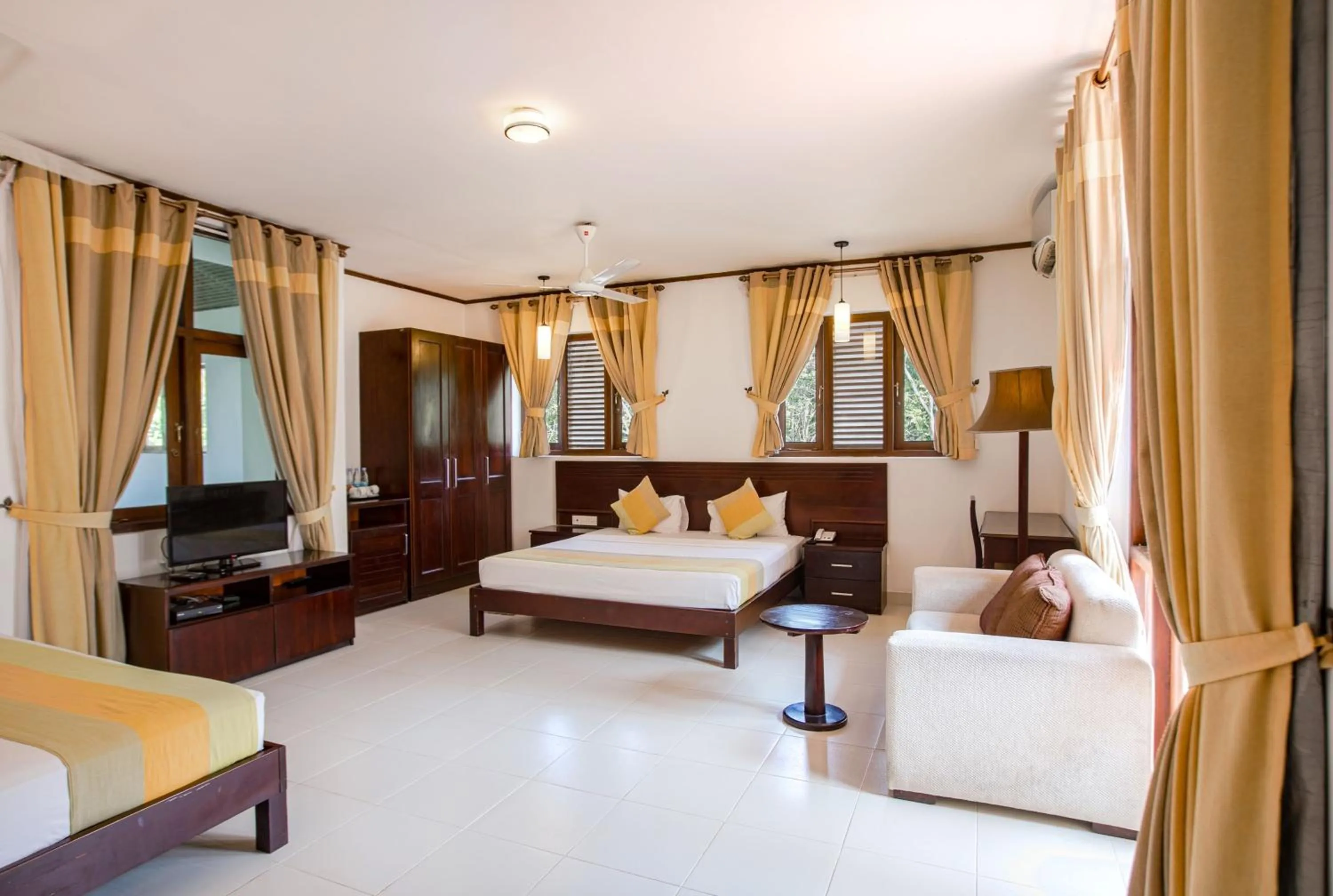 Bed in Lavendish Okrin Hotel