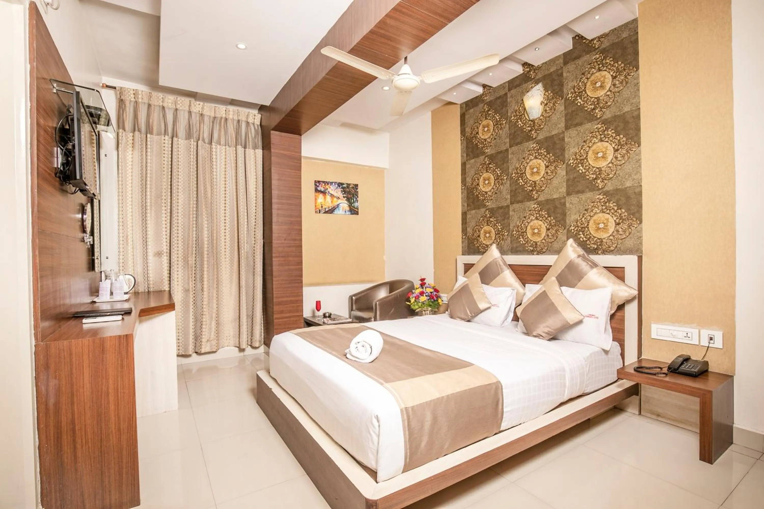 Bed in Aishwarya Suites