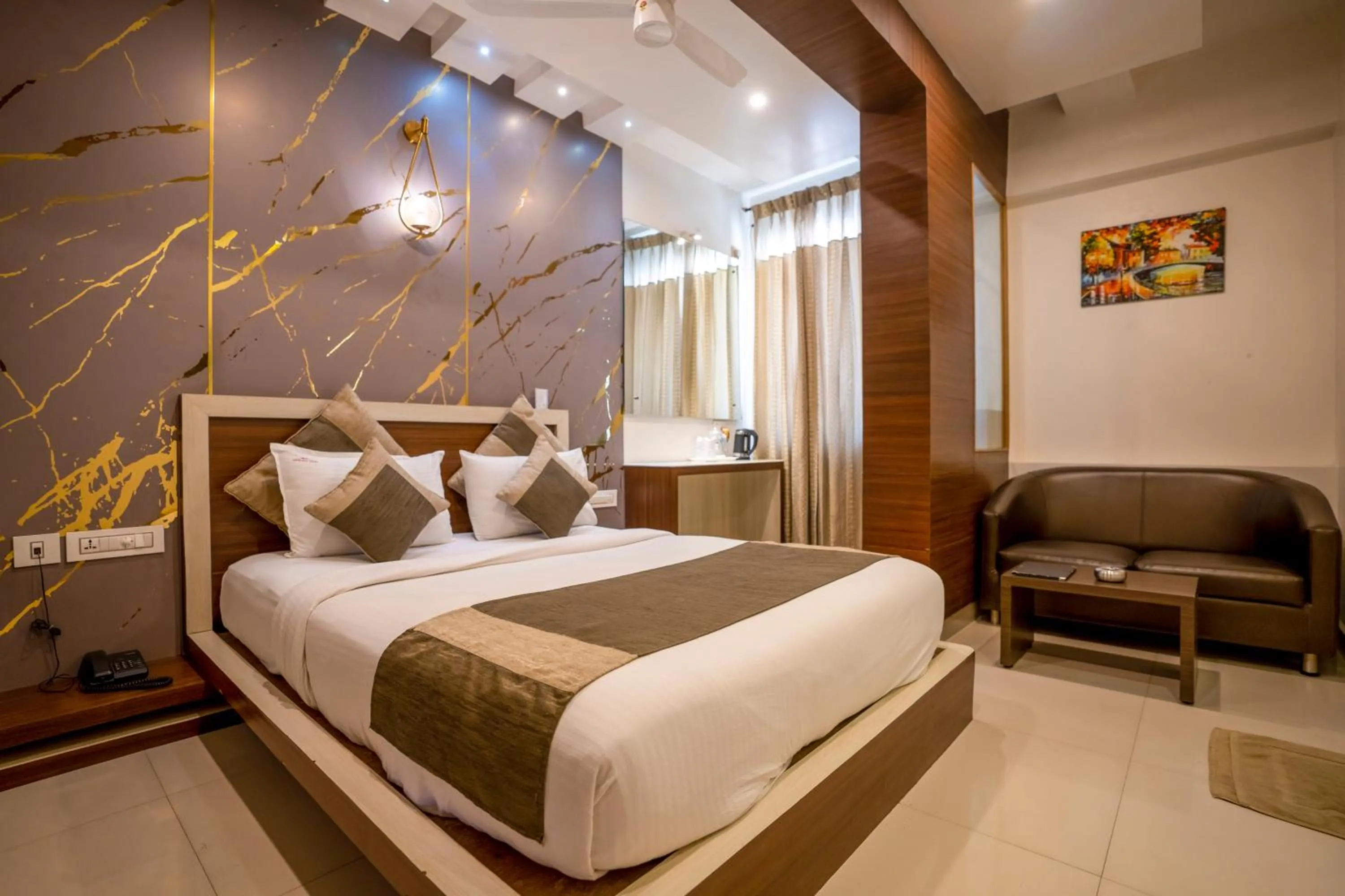 Bed in Aishwarya Suites