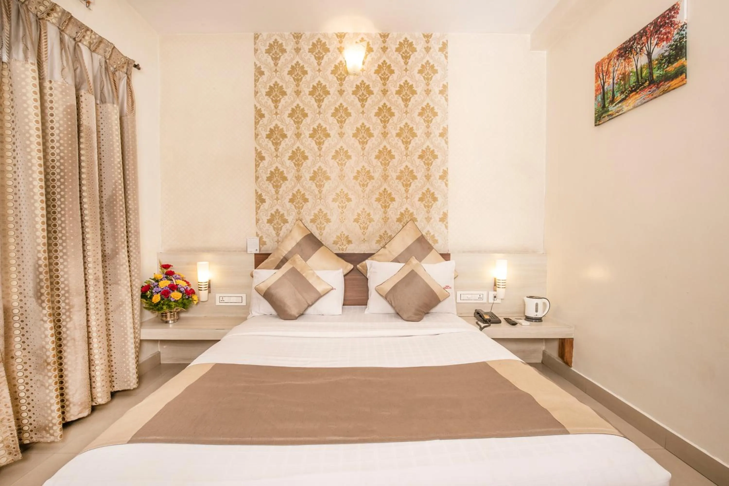 Bed in Aishwarya Suites