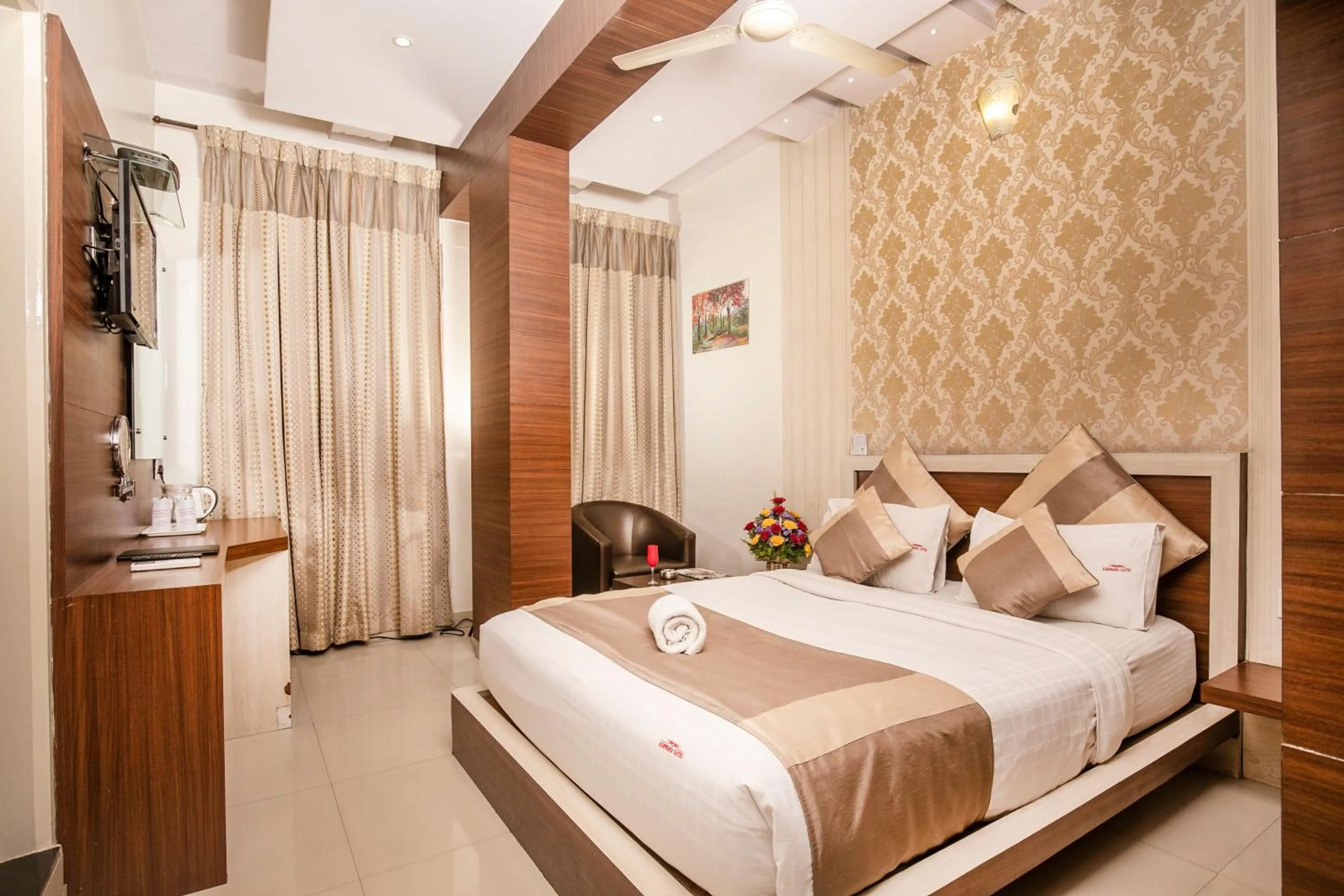 Bed in Aishwarya Suites