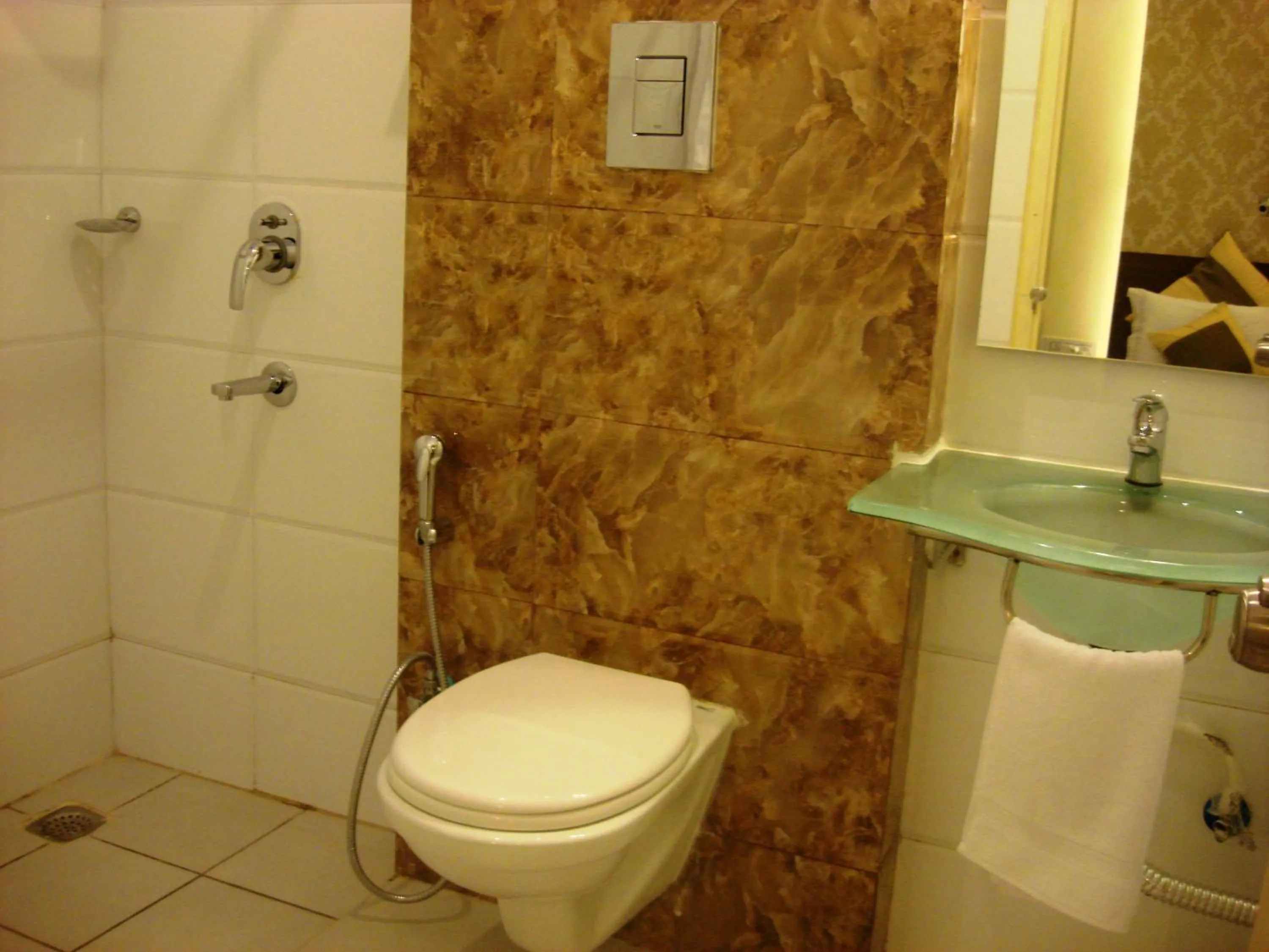 Bathroom in Aishwarya Suites