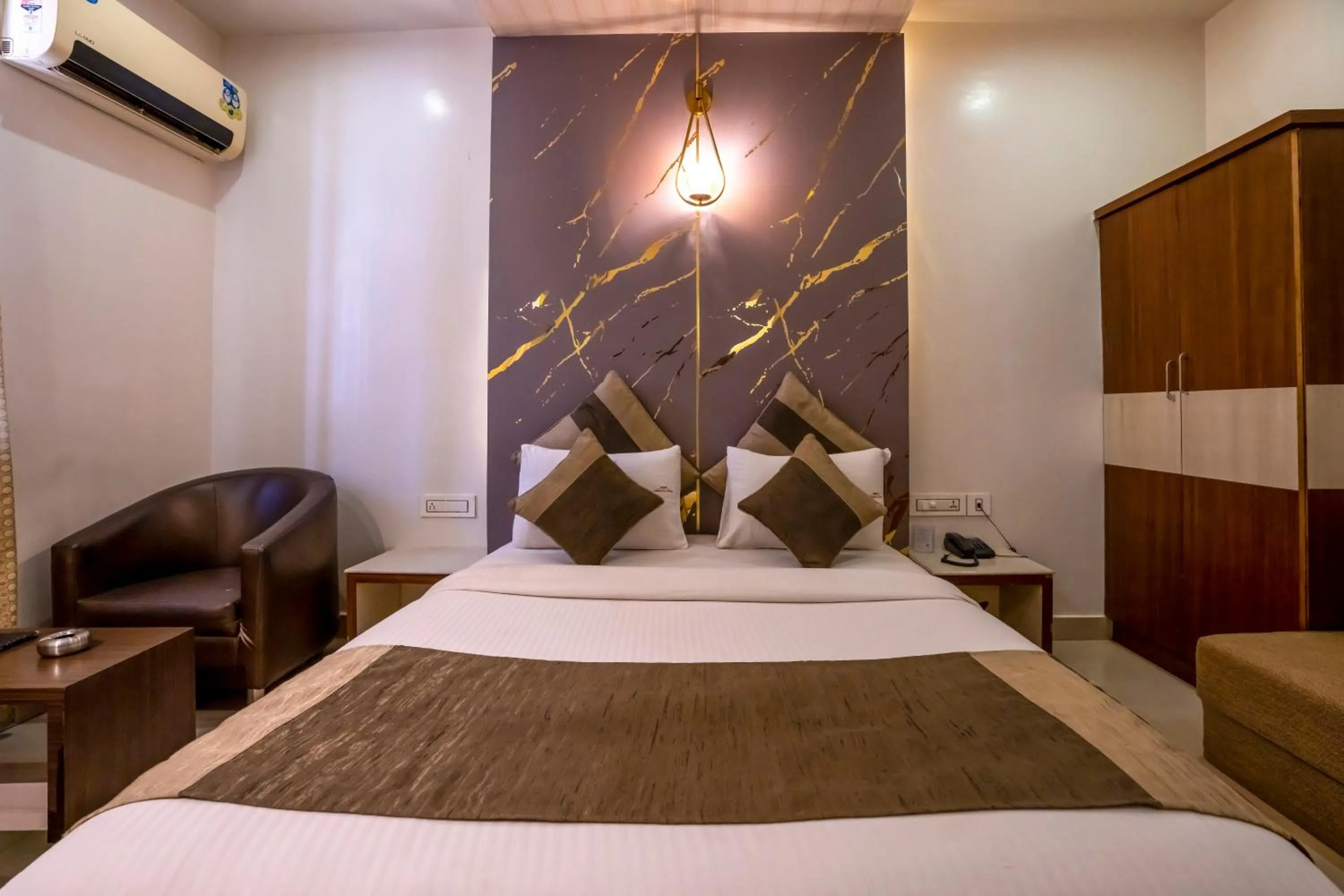 Bed in Aishwarya Suites