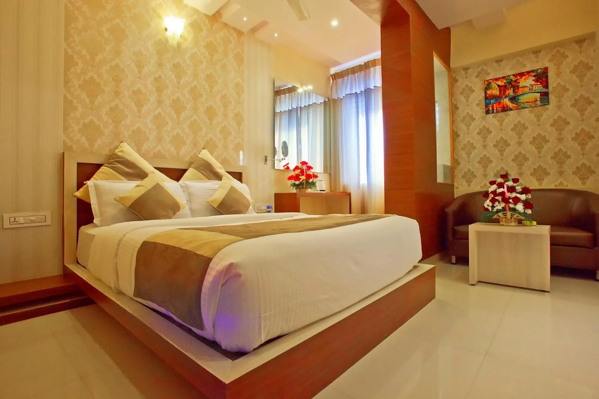 Bed in Aishwarya Suites