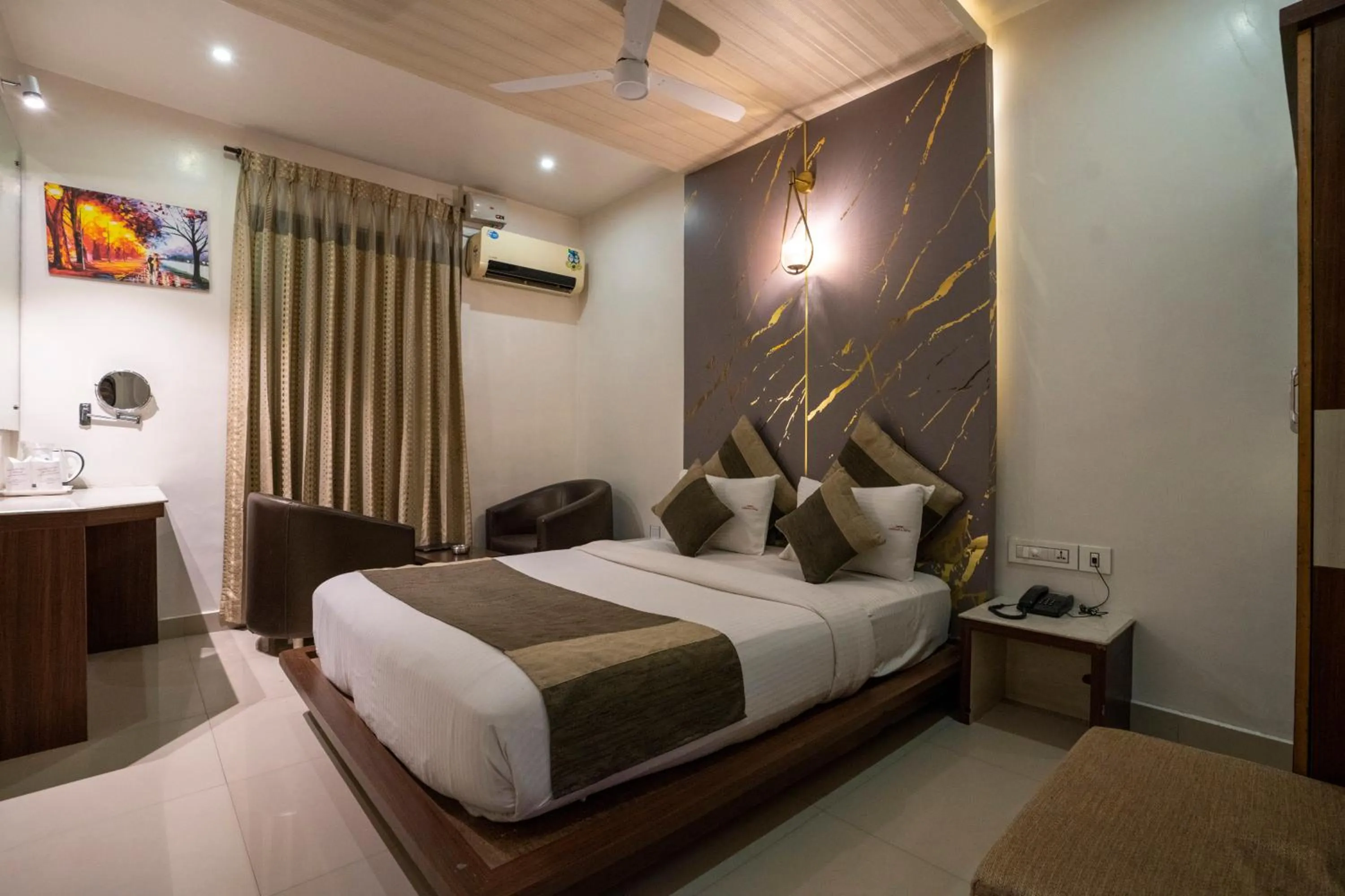 Bed in Aishwarya Suites