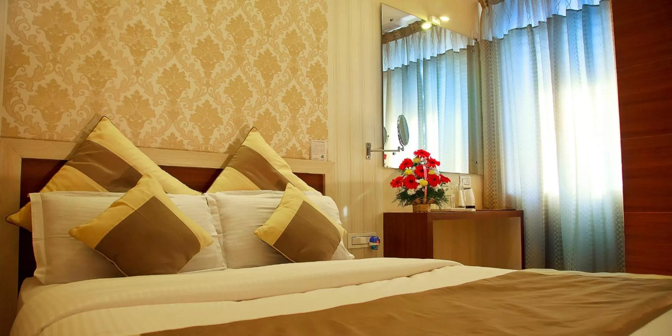 Bed in Aishwarya Suites