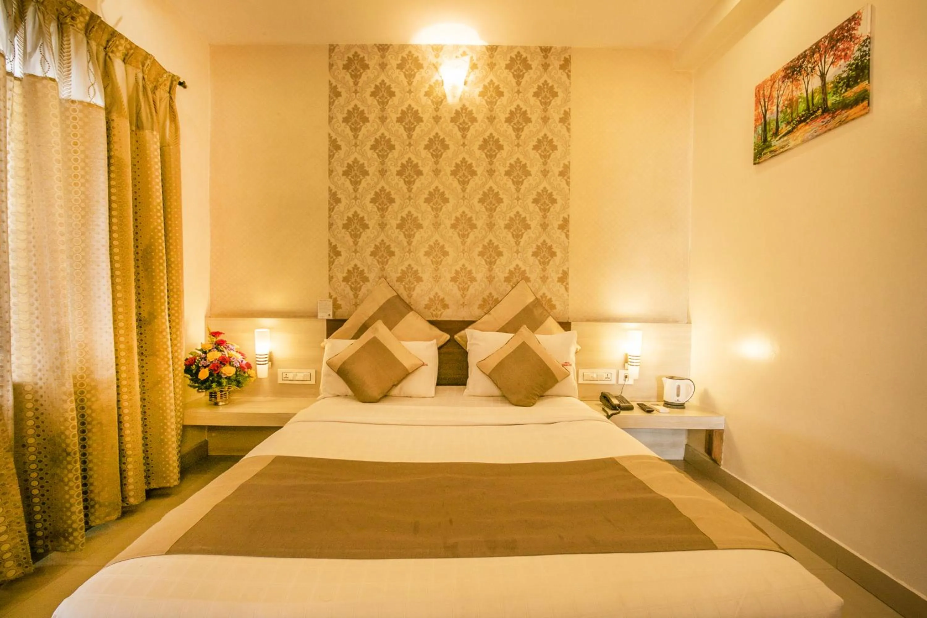 Bed in Aishwarya Suites