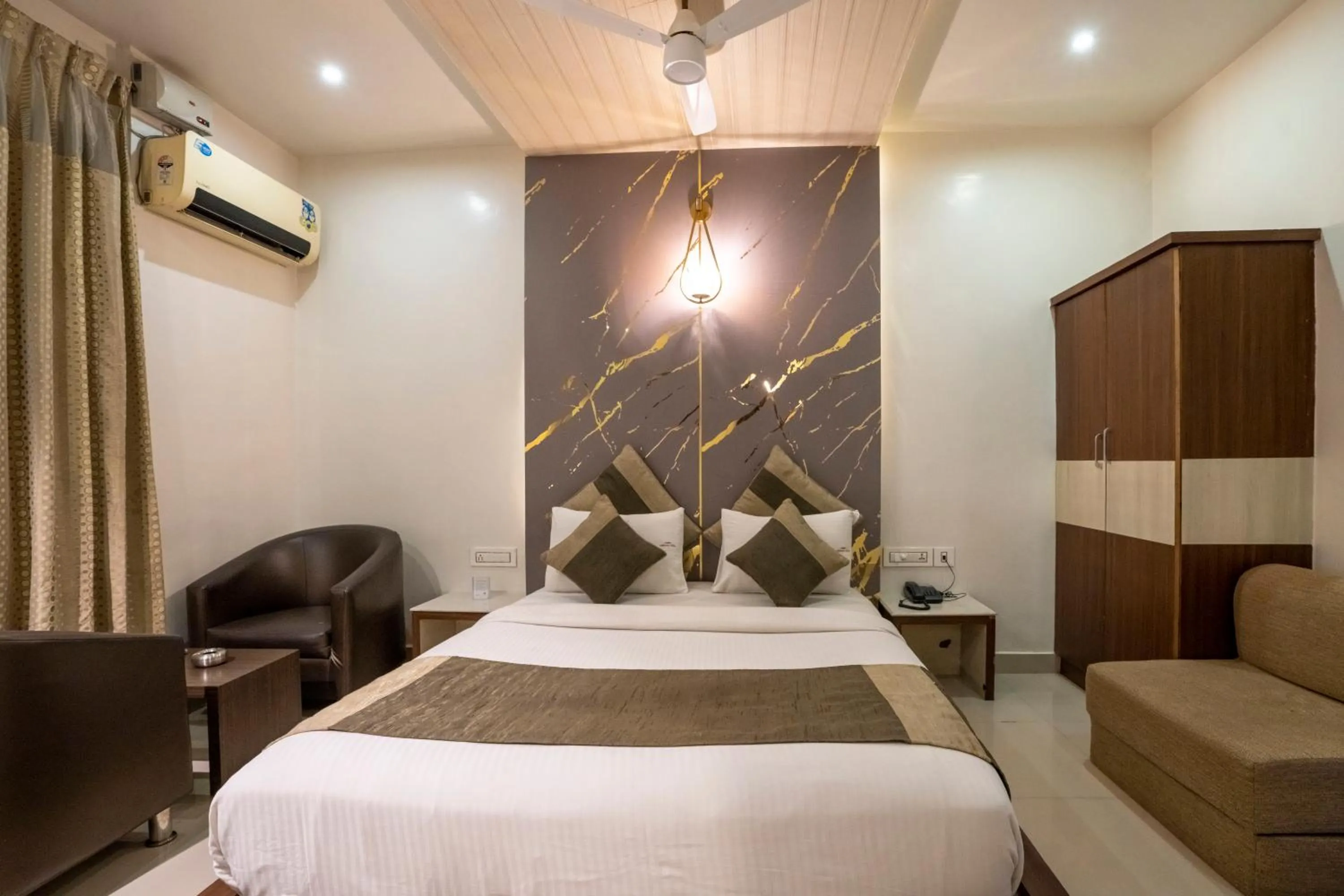 Bed in Aishwarya Suites