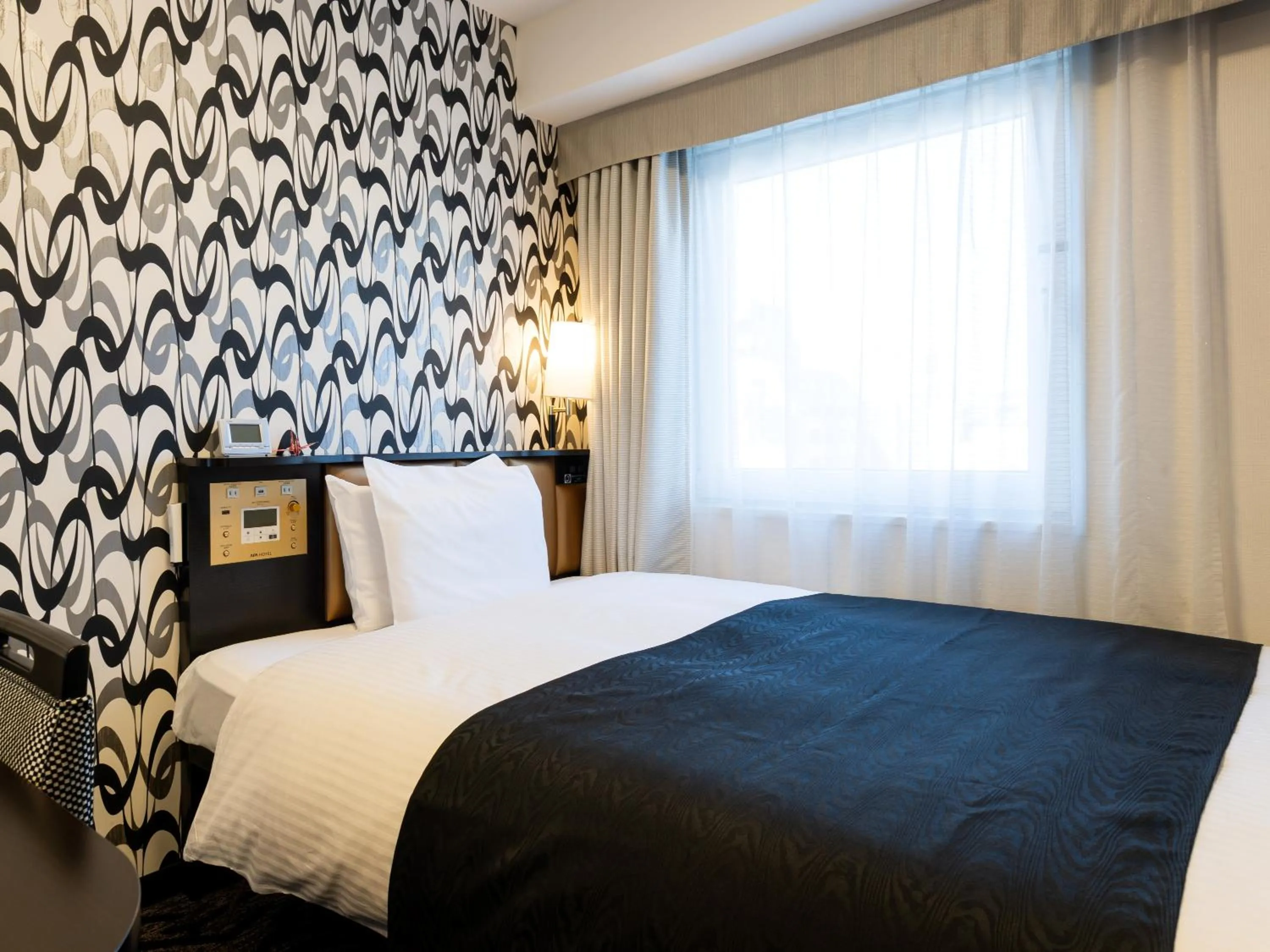 Photo of the whole room, Bed in APA Hotel Namba Shinsaibashi Higashi