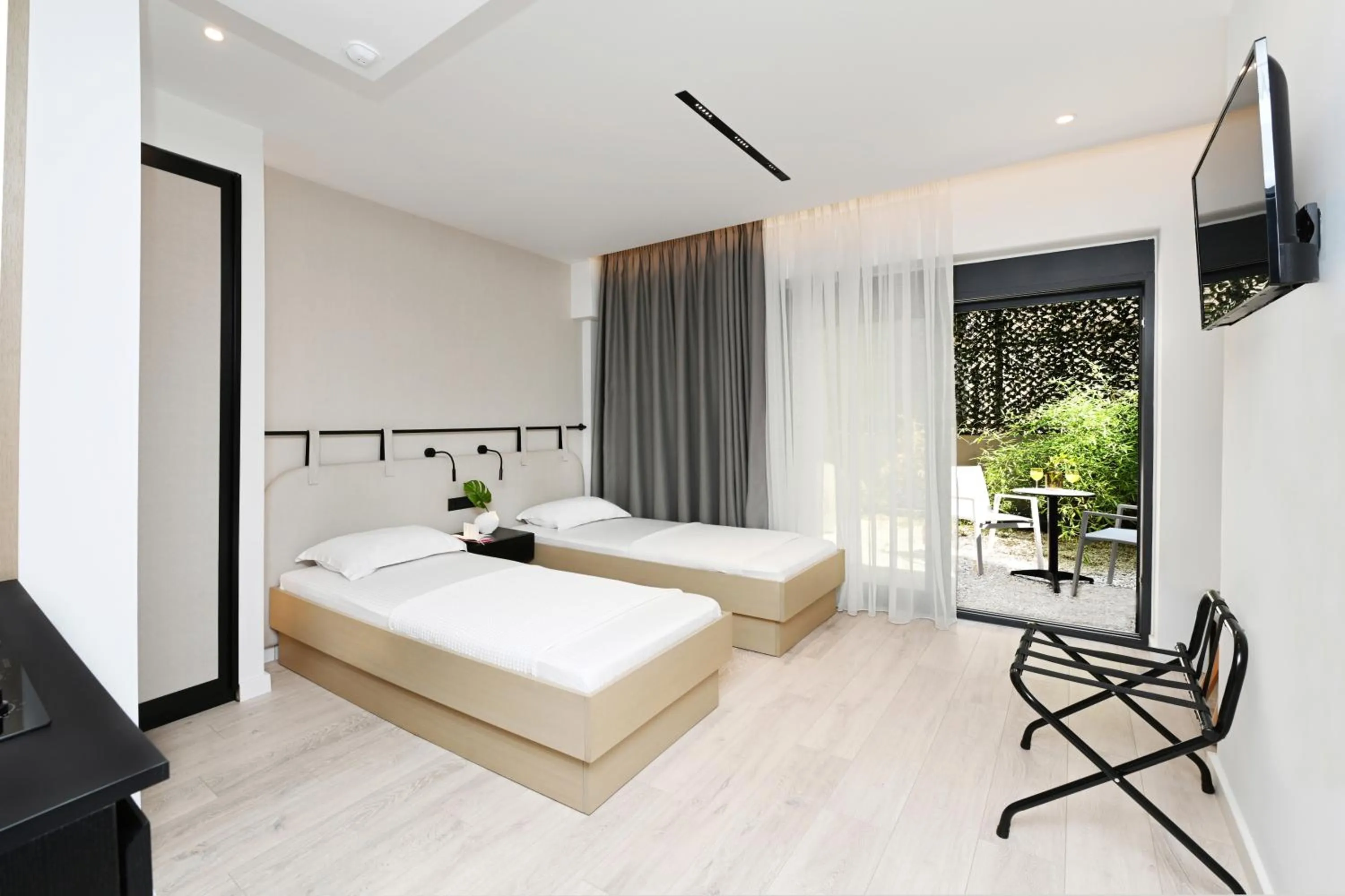 Communal lounge/ TV room, Bed in ICON Urban Living