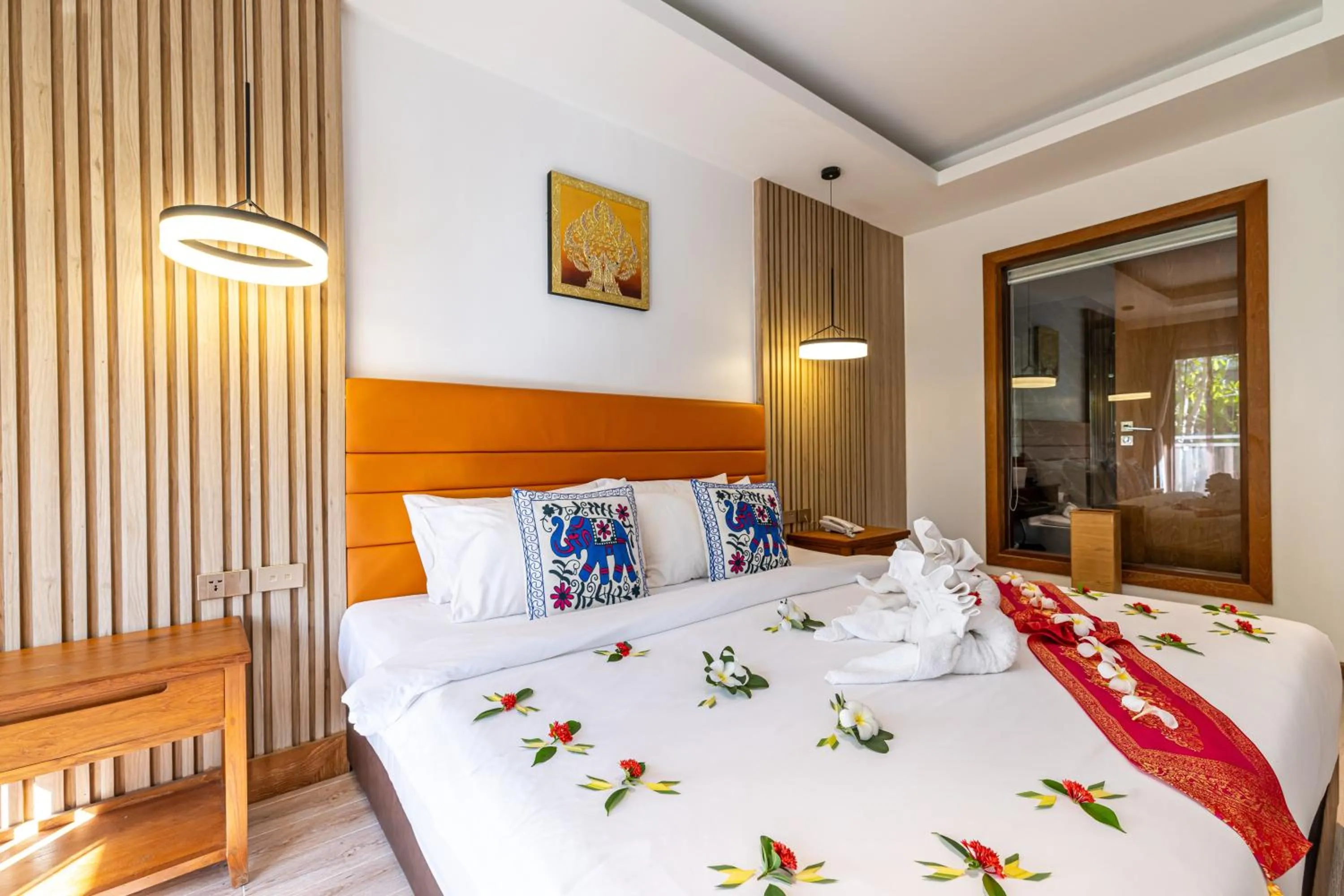 Bed in Royal Yao Yai Island Beach Resort