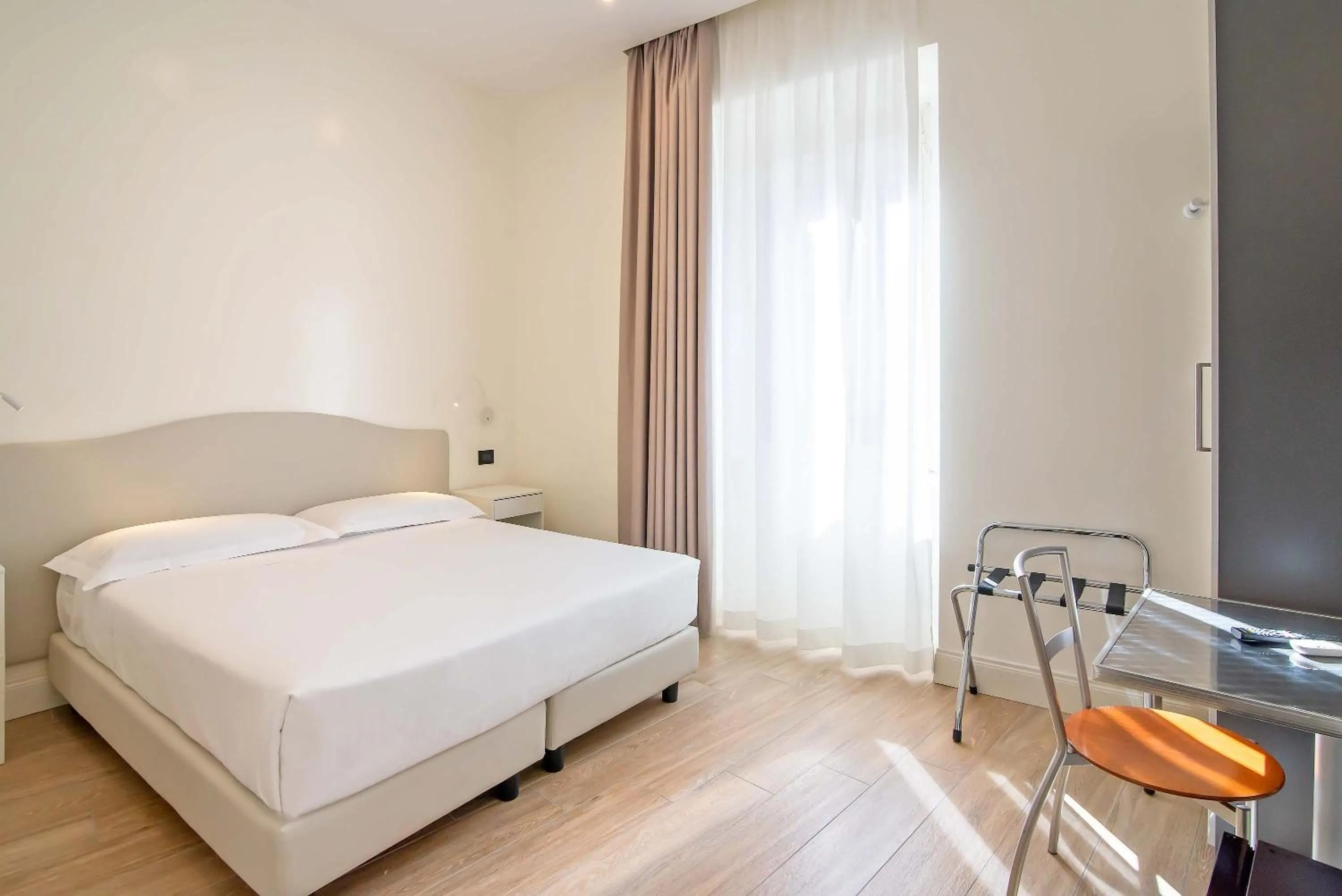 Bed in Hotel Aphrodite