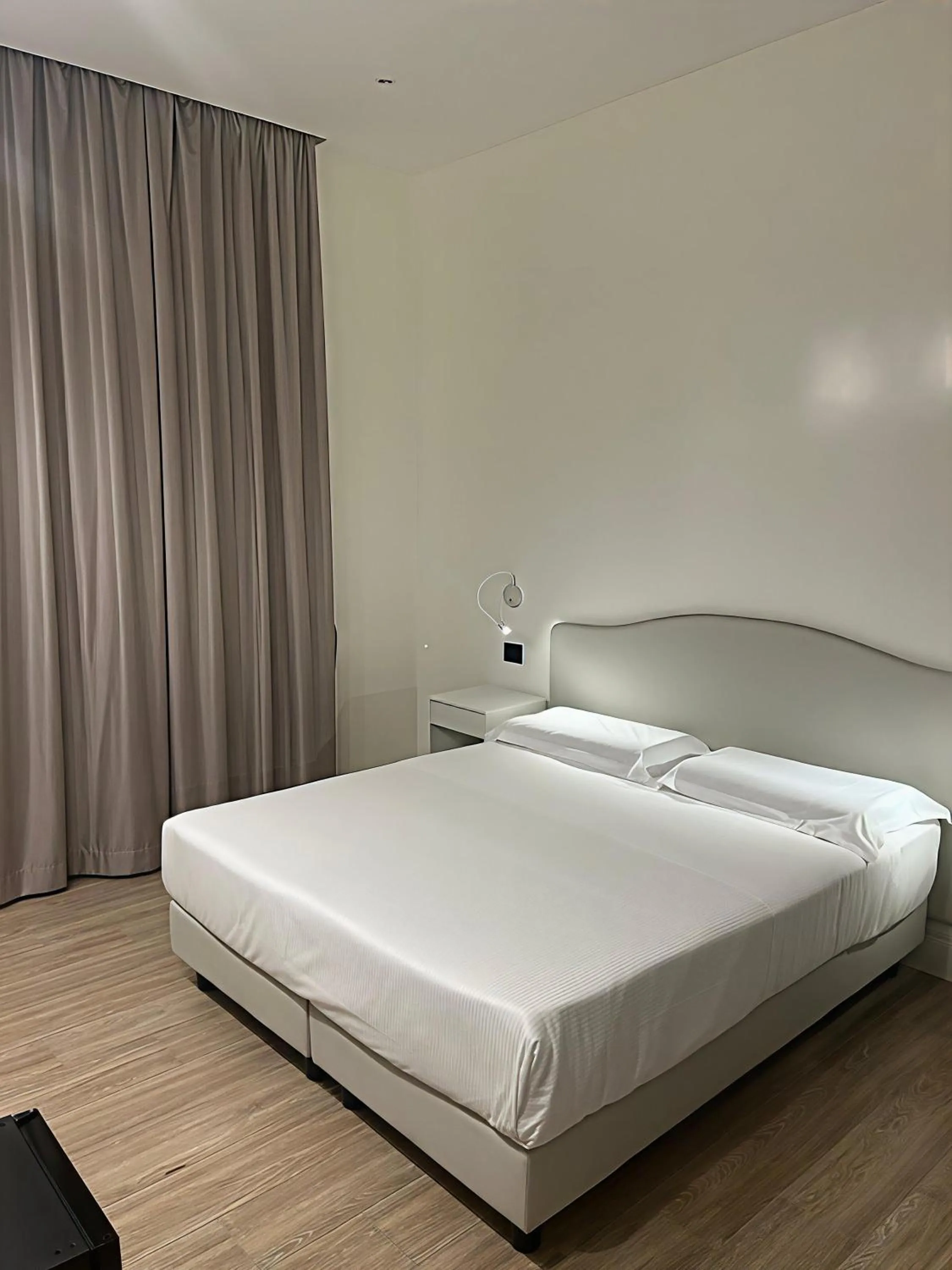 Bed in Hotel Aphrodite