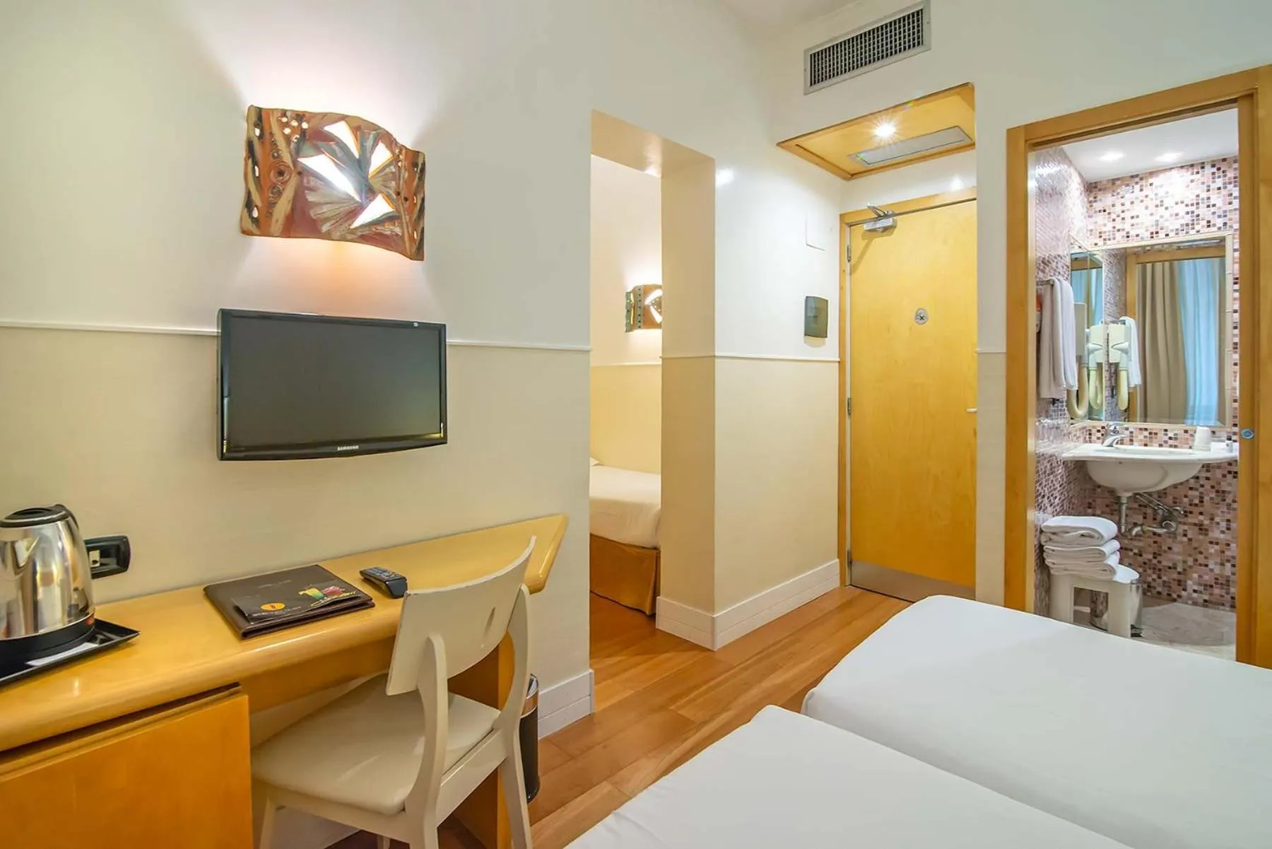 Bed in Hotel Aphrodite