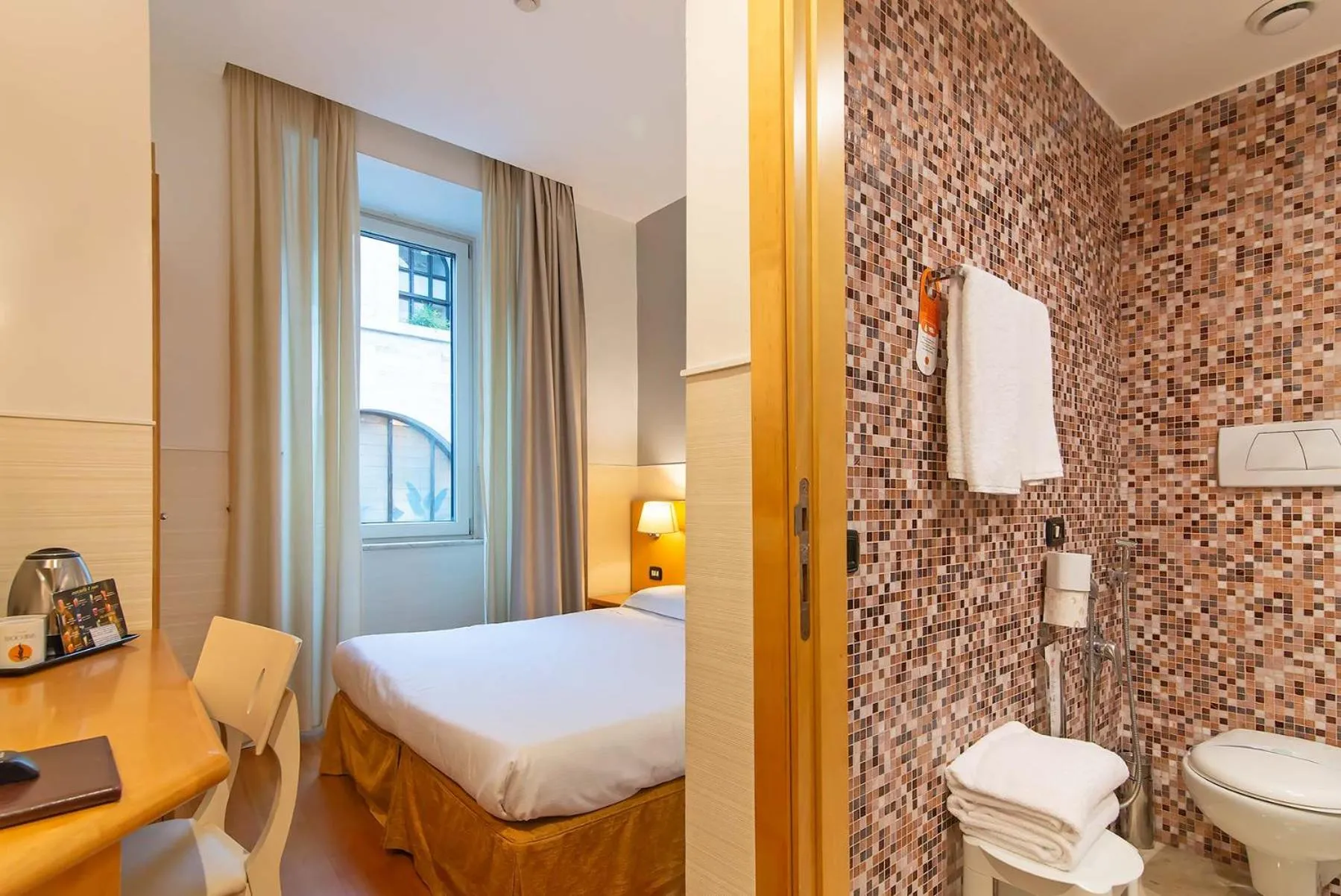 Bed in Hotel Aphrodite