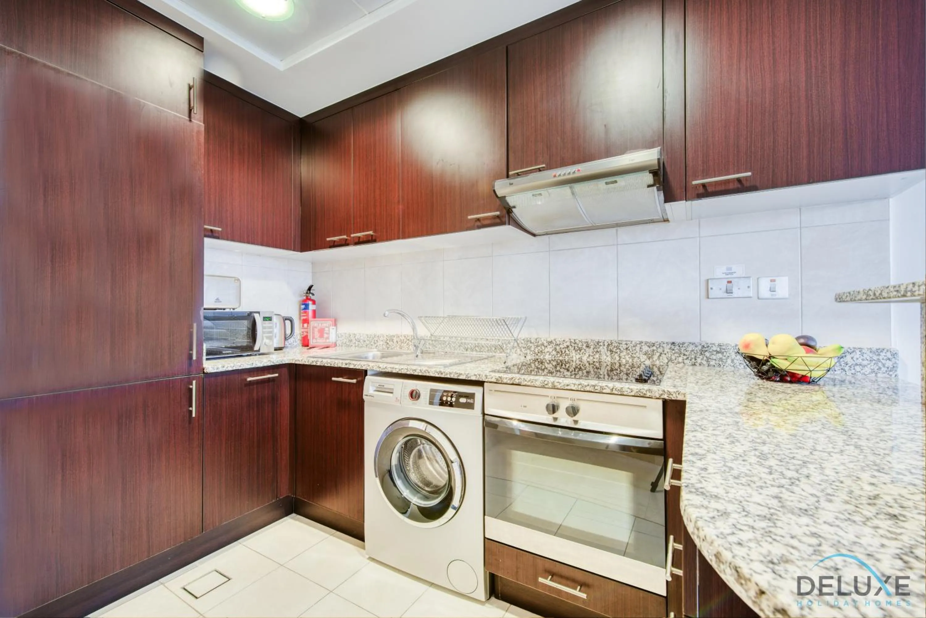 Kitchen or kitchenette in Calm Studio at Sky Gardens DIFC by Deluxe Holiday Homes