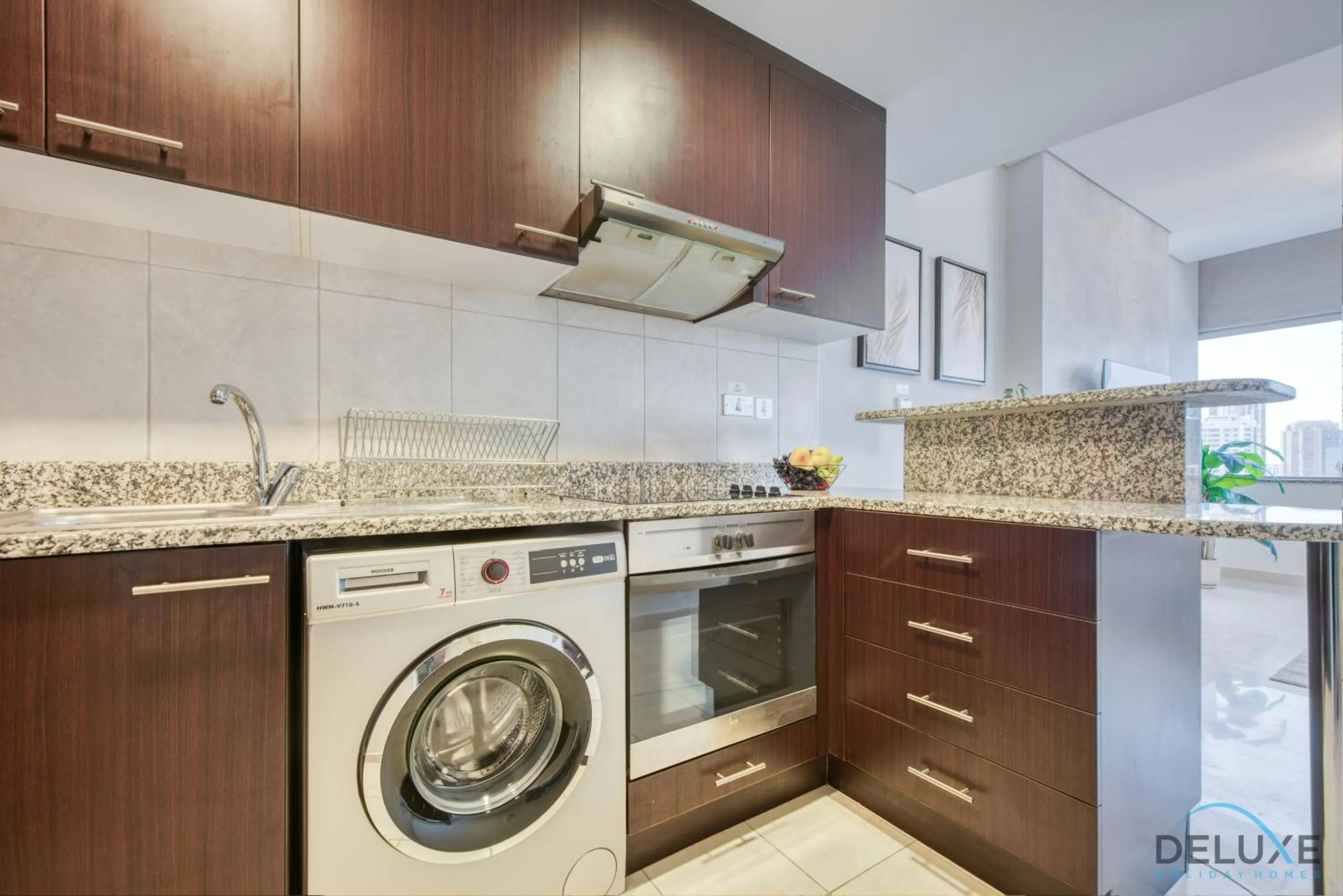 Kitchen or kitchenette in Calm Studio at Sky Gardens DIFC by Deluxe Holiday Homes
