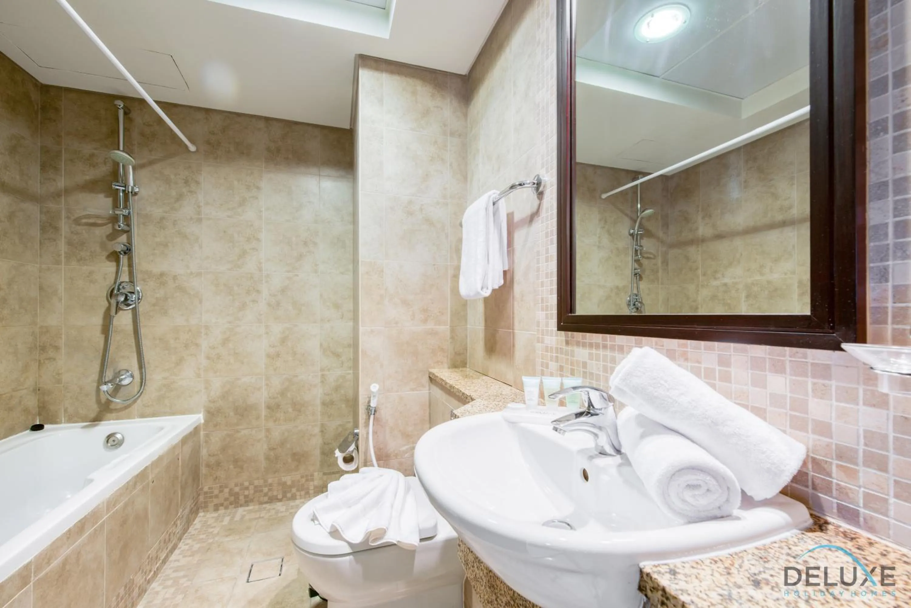 Bathroom in Calm Studio at Sky Gardens DIFC by Deluxe Holiday Homes