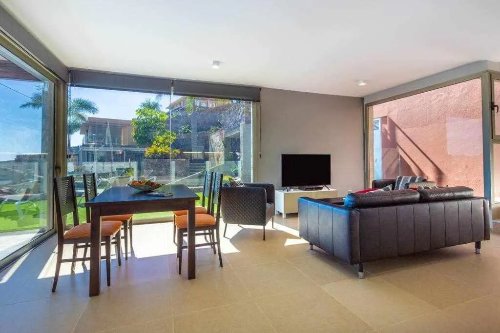 Communal lounge/ TV room in Villa Los Dragos Golf by Infinity Summer