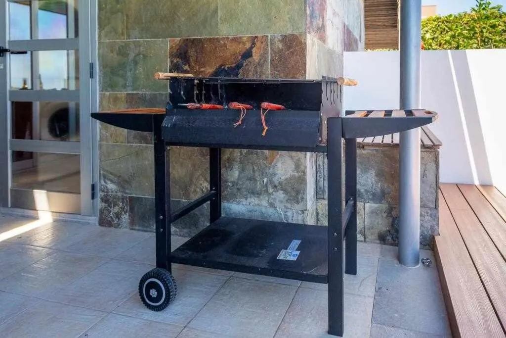 BBQ facilities in Villa Los Dragos Golf by Infinity Summer