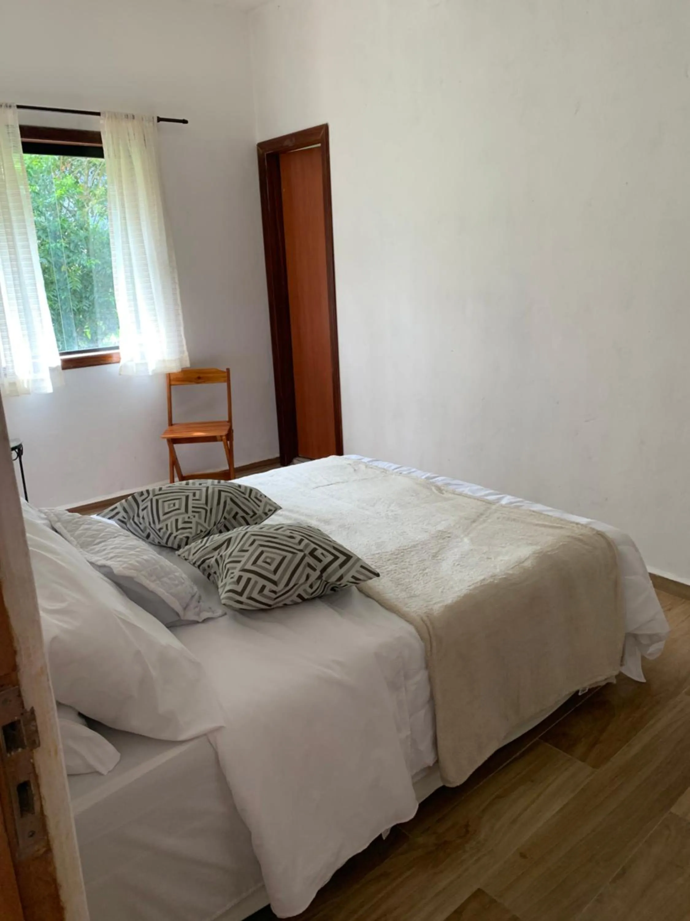 Bed in Pousada Canto das Cachoeiras