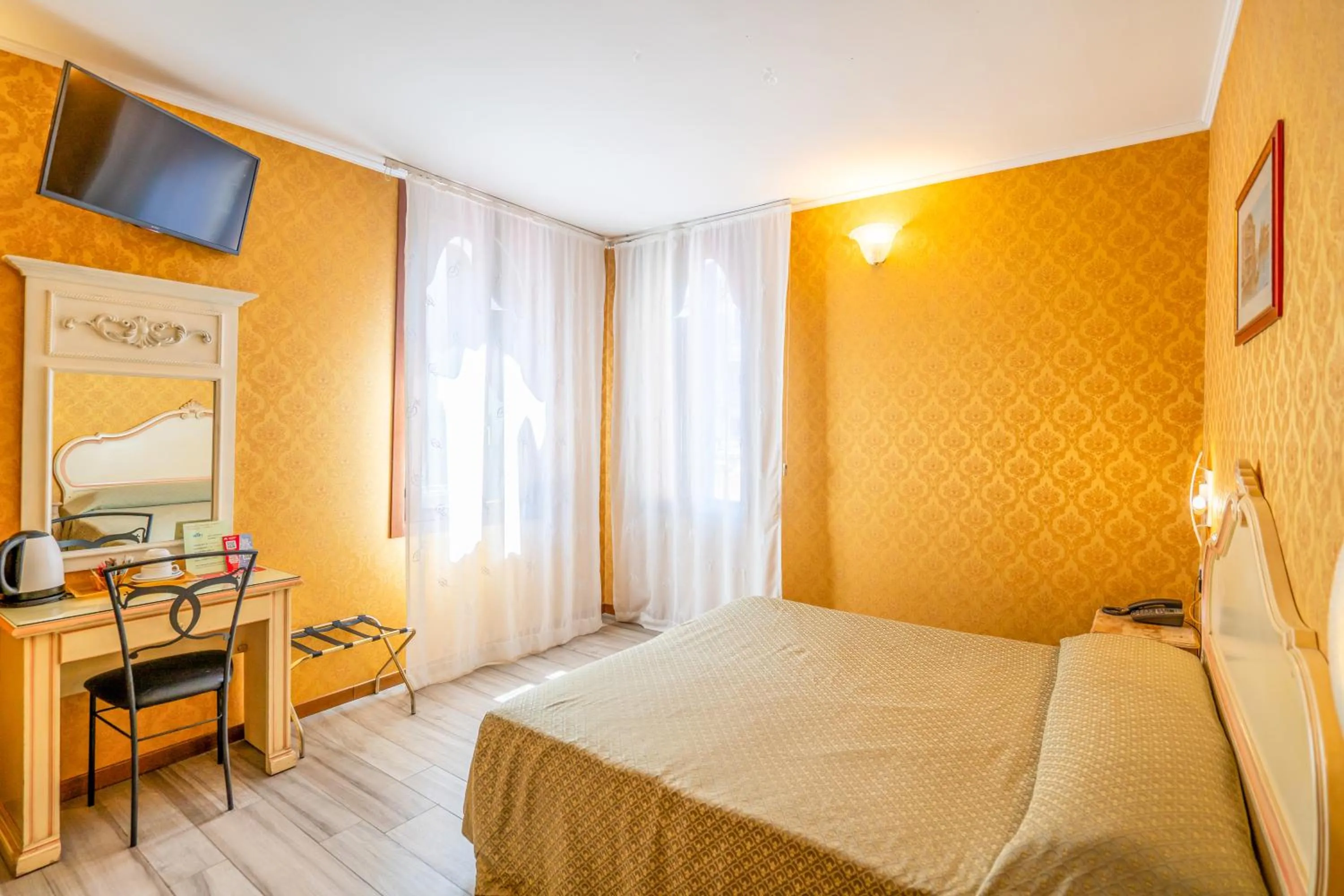 Bed in Hotel Tintoretto