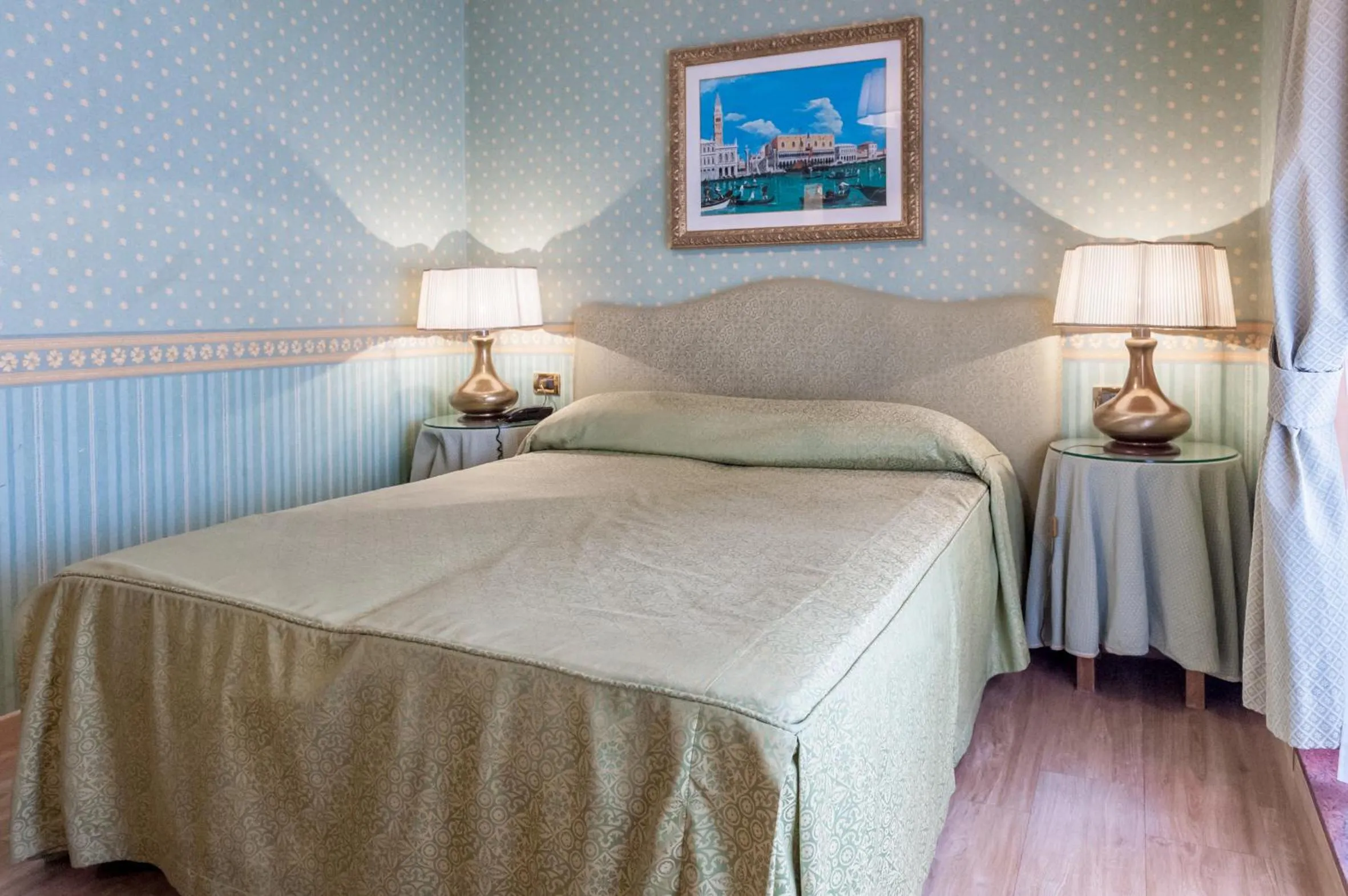 Bed in Hotel Venezia