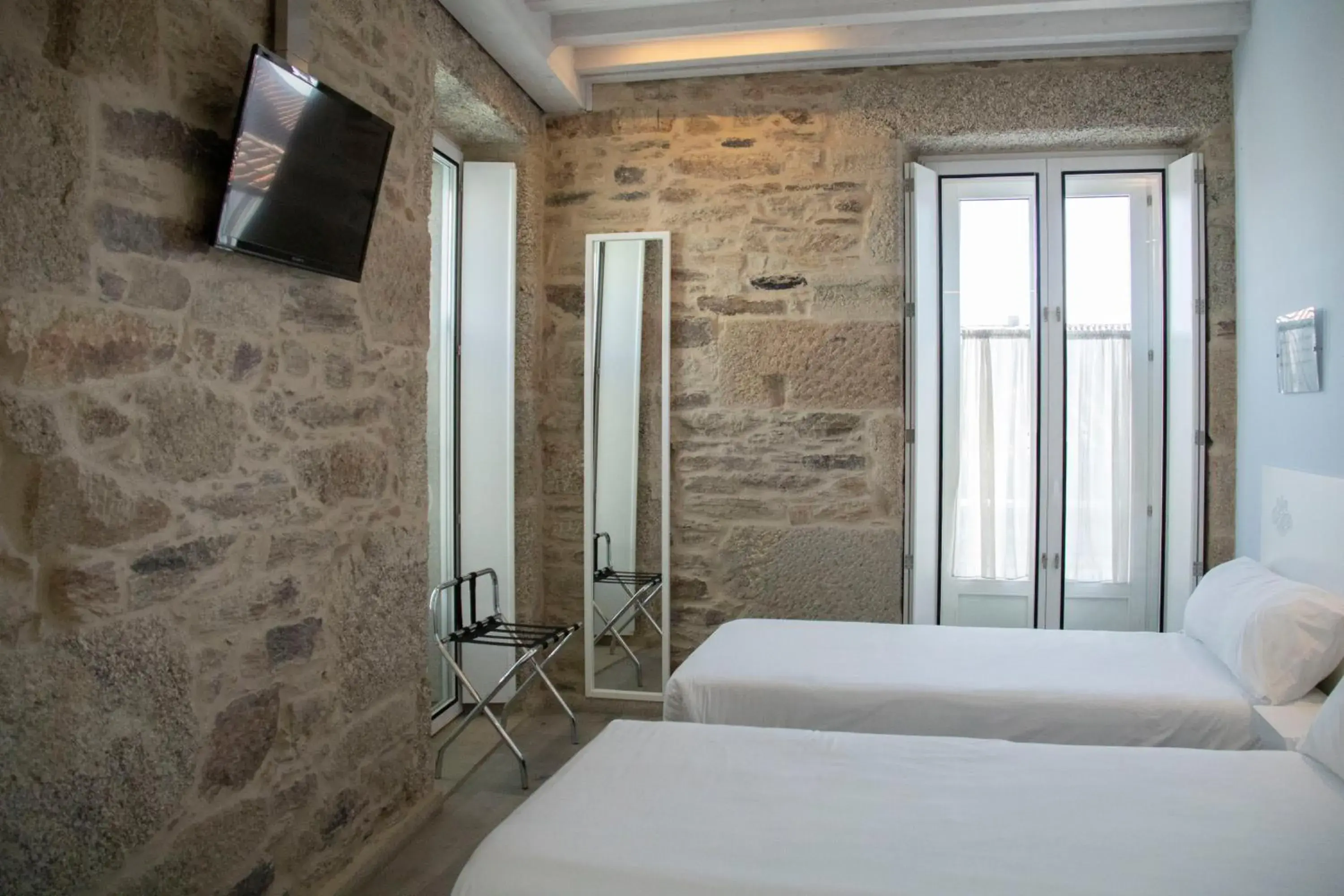 TV and multimedia, Bed in Hotel Alda San Bieito TV and multimedia, Bed in Hotel Alda San Bieito