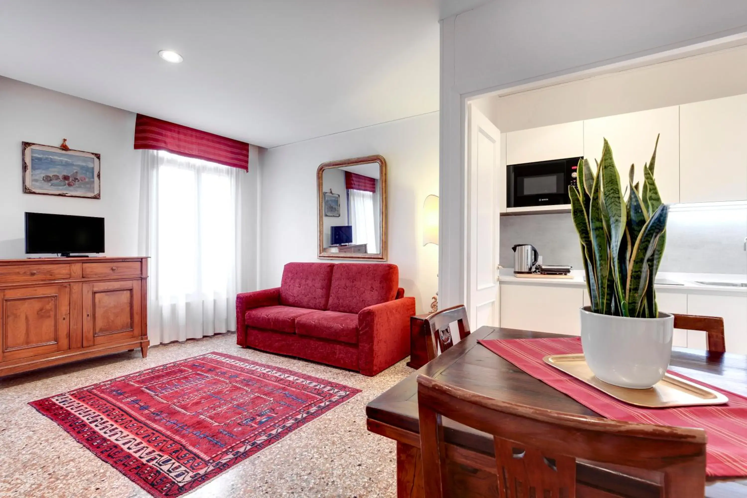 Living room in Palazzo Schiavoni Residenza d'epoca & Suite-Apartments Living room in Palazzo Schiavoni Residenza d'epoca & Suite-Apartments