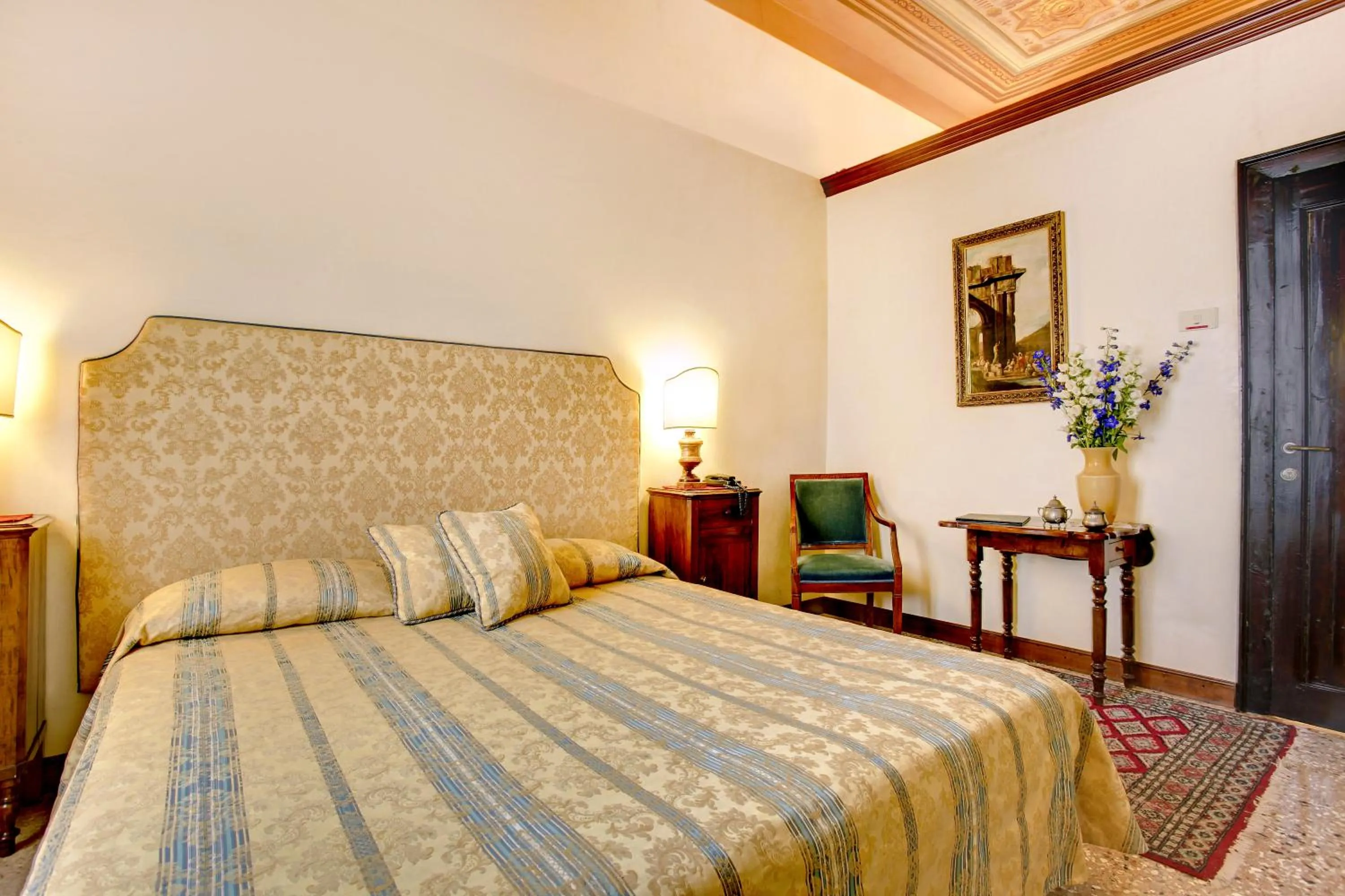 Bed in Palazzo Schiavoni Residenza d'epoca & Suite-Apartments