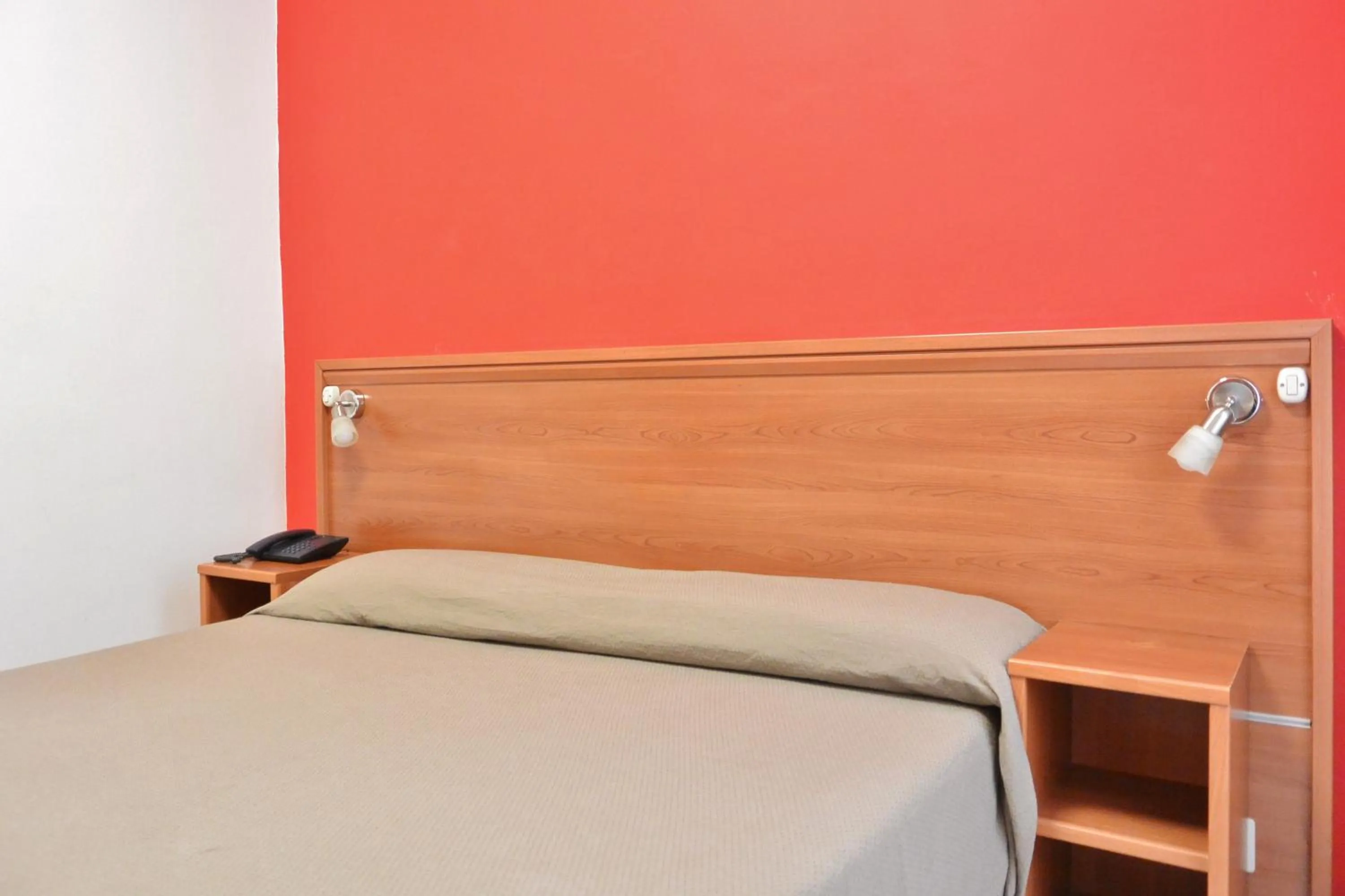 Bed in Hotel Trentina