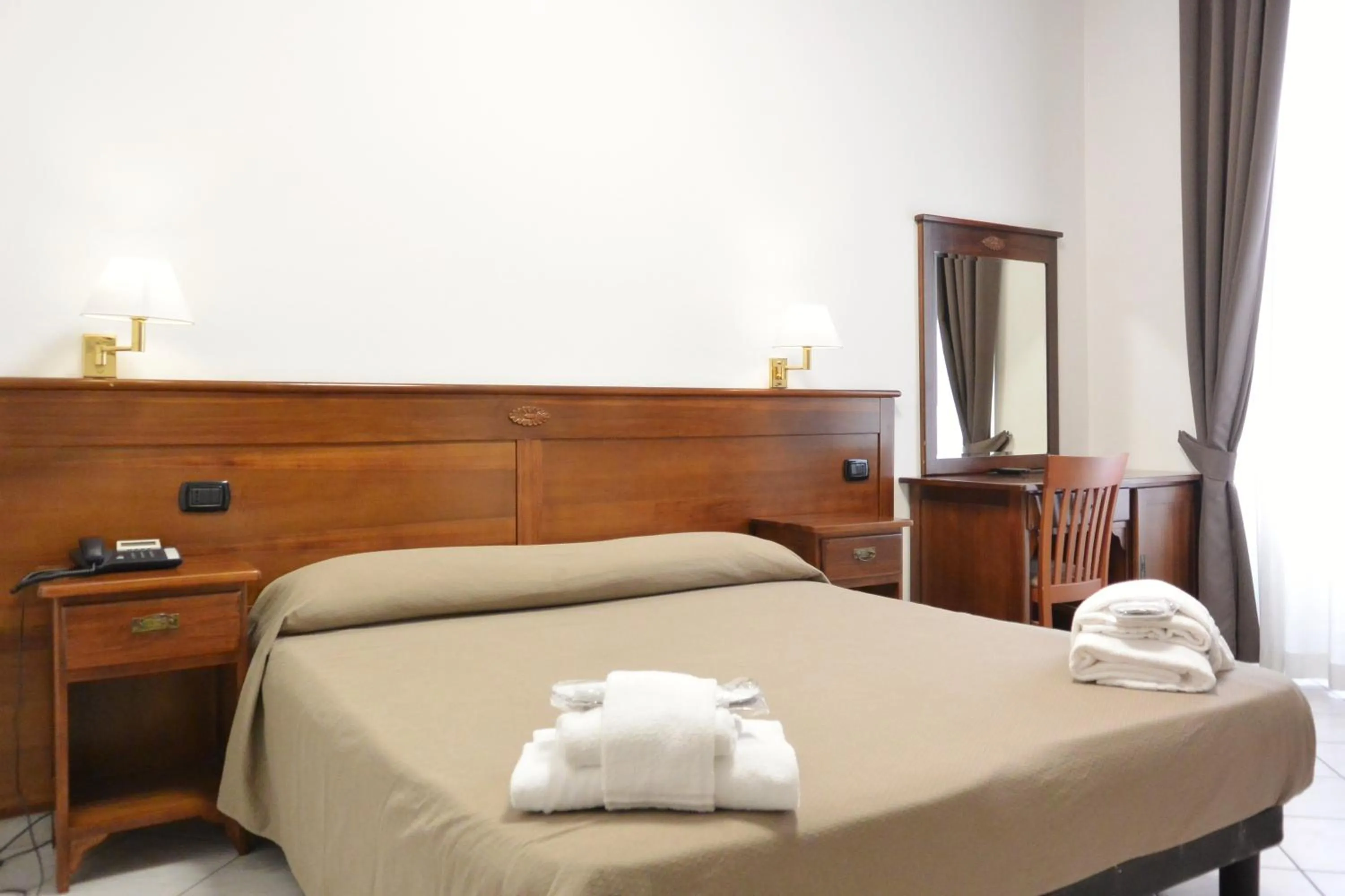 Bed in Hotel Trentina