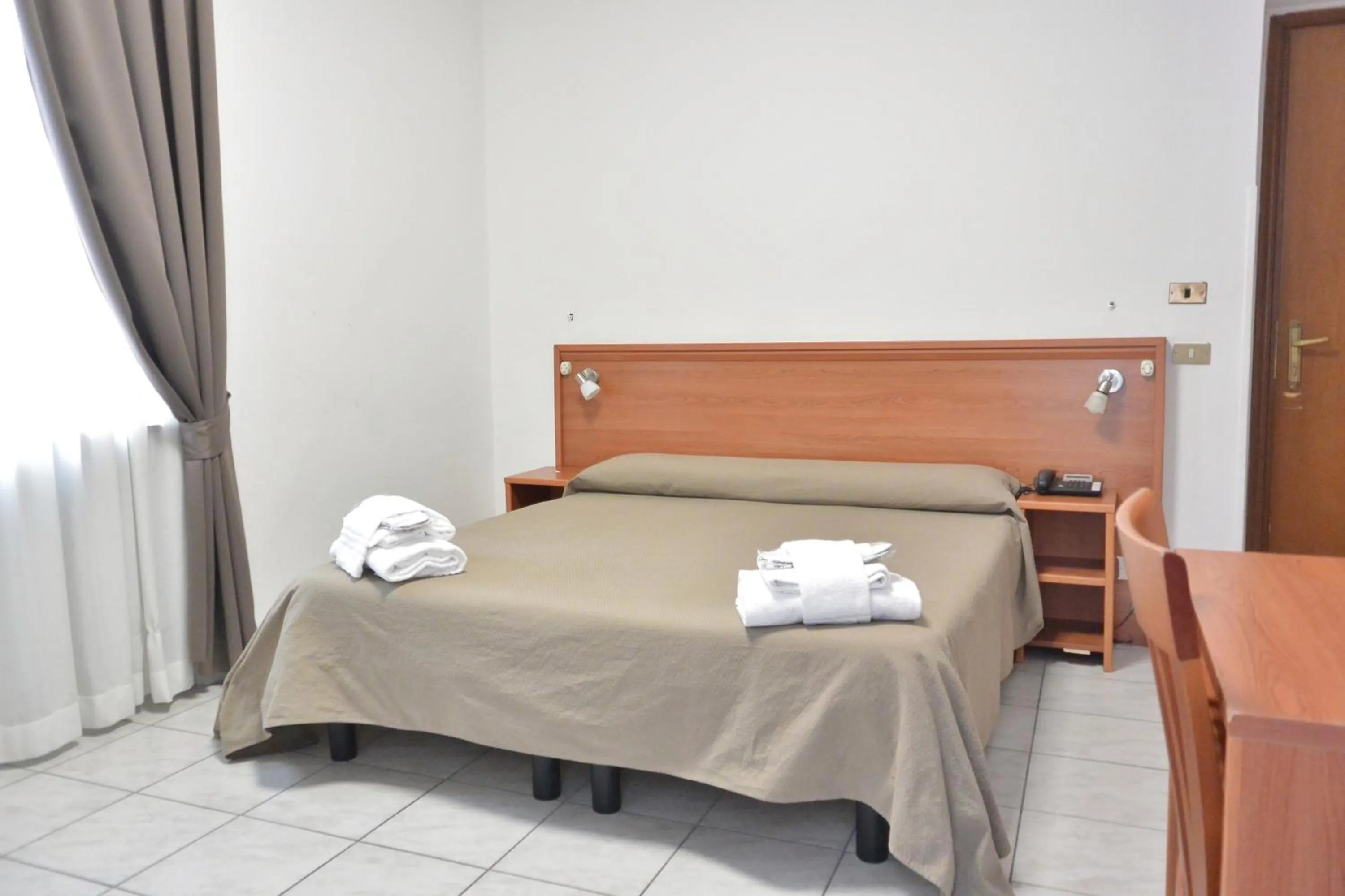 Bed in Hotel Trentina