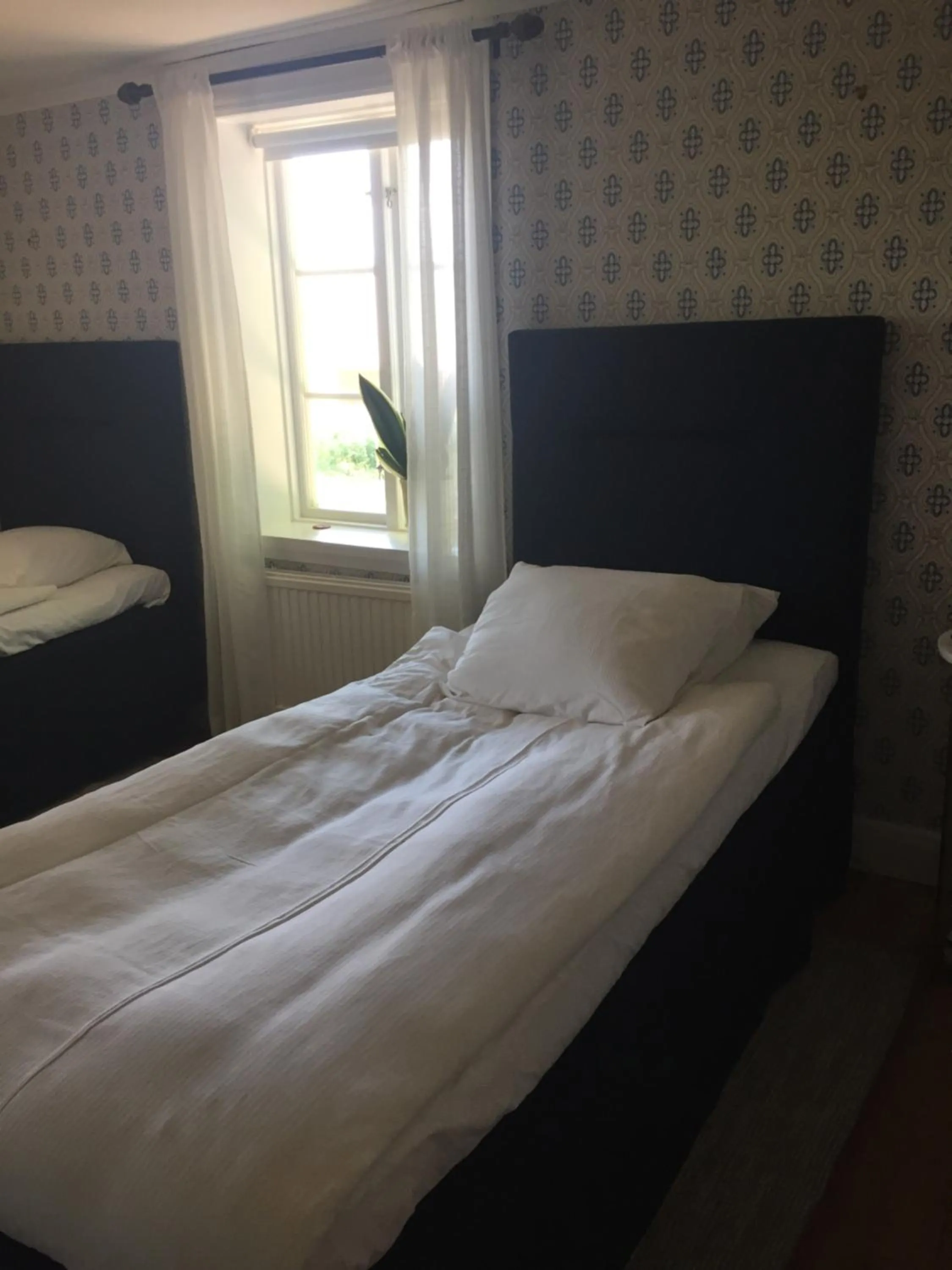Bed in Bjälbo Gästhus B&B