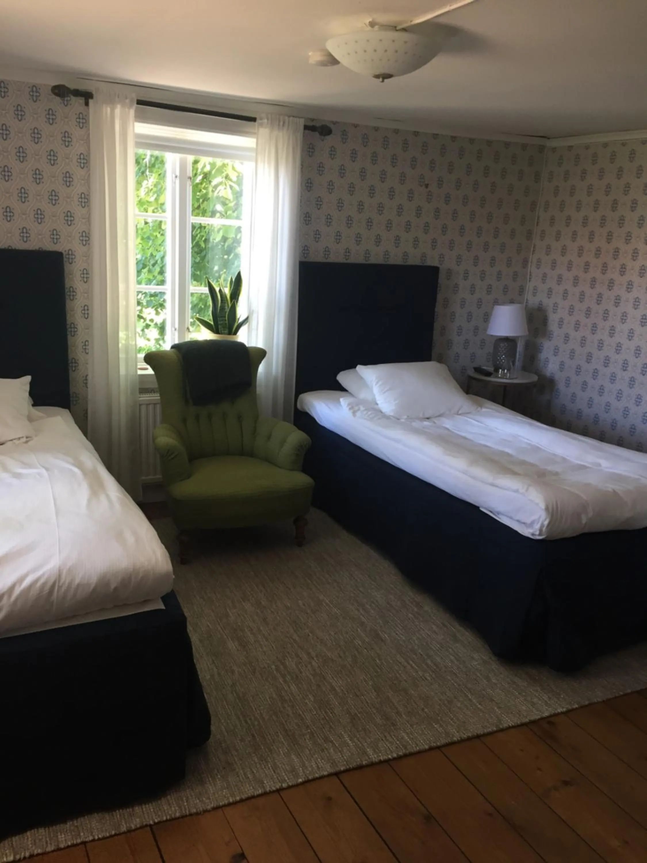 Bed in Bjälbo Gästhus B&B