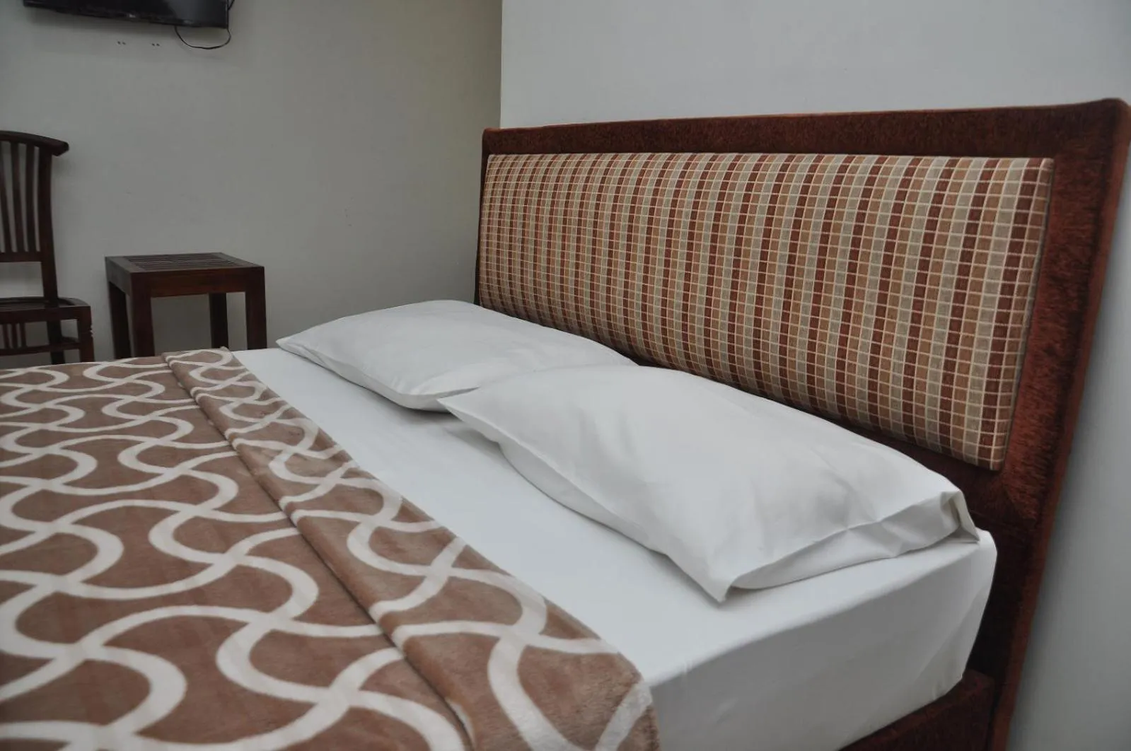 Bed in Saasha City Hotel