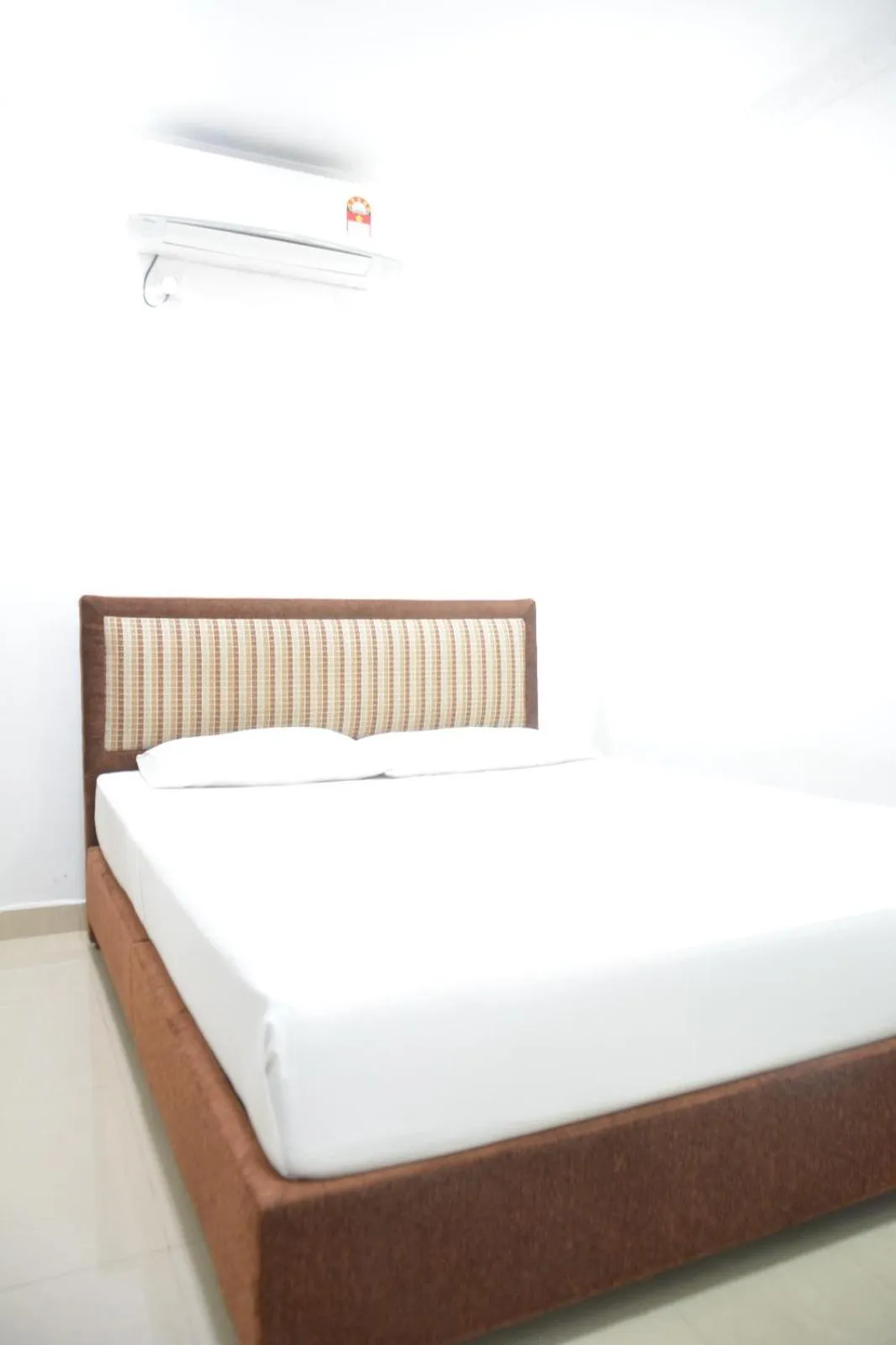 Bed in Saasha City Hotel