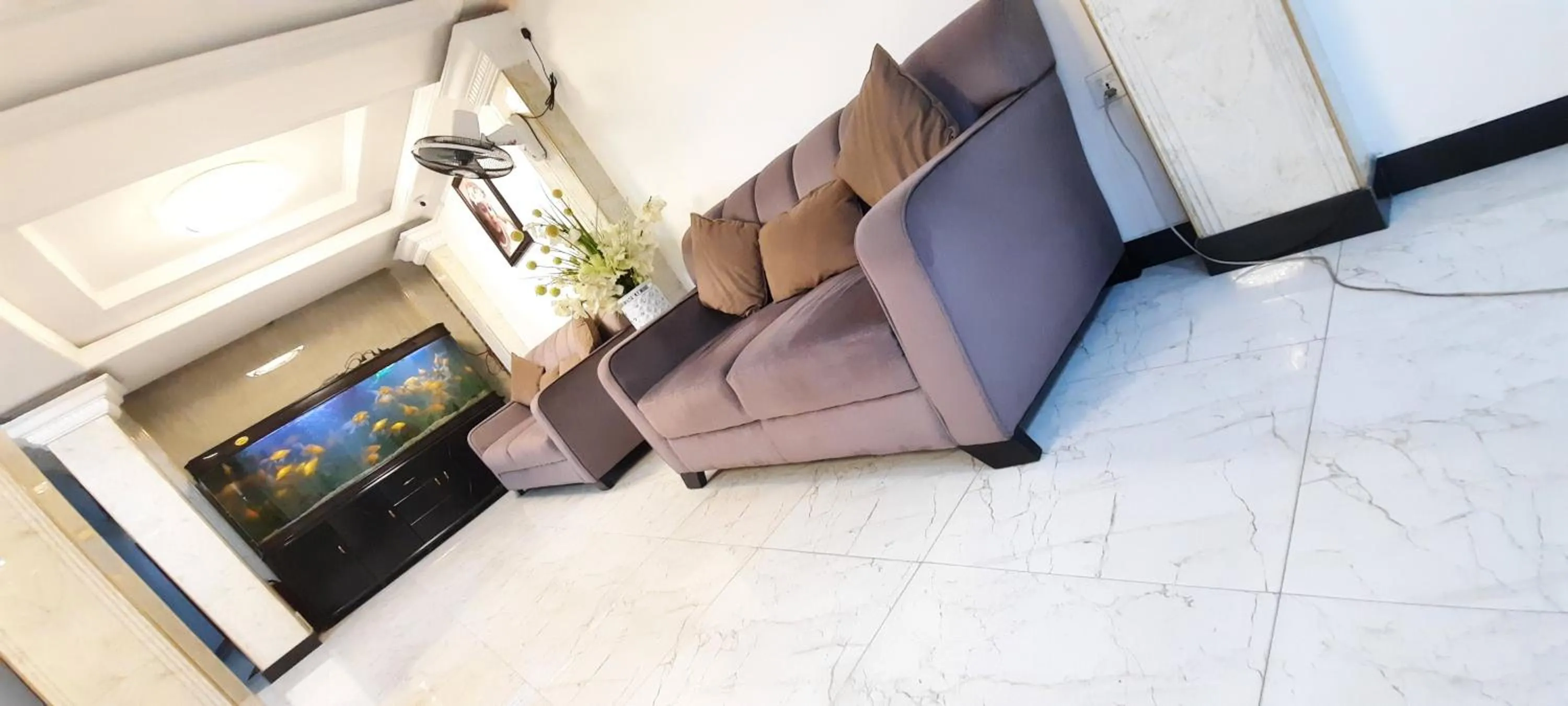 Communal lounge/ TV room in Saasha City Hotel