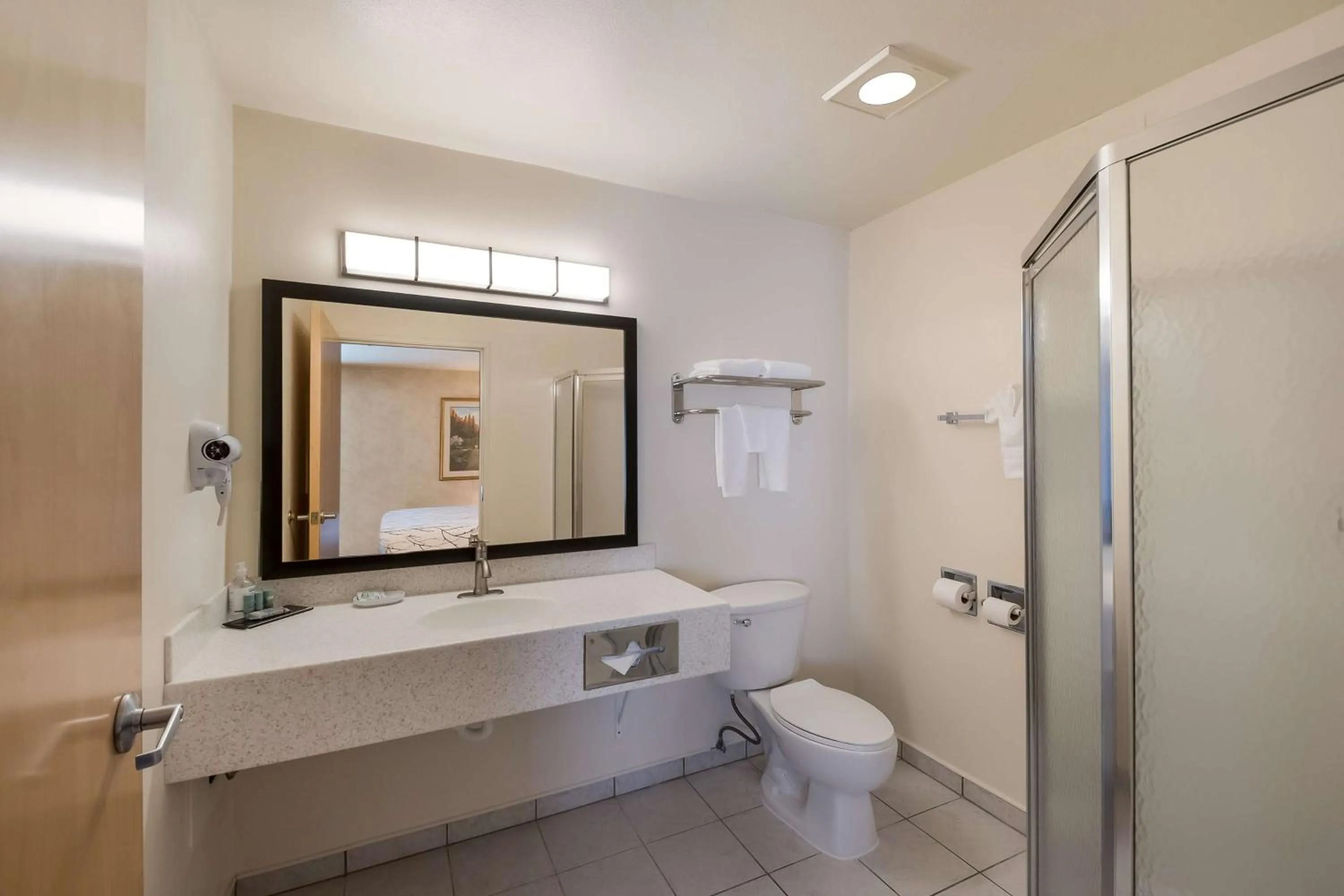 Bathroom in SureStay Plus Hotel by Best Western SeaTac Airport