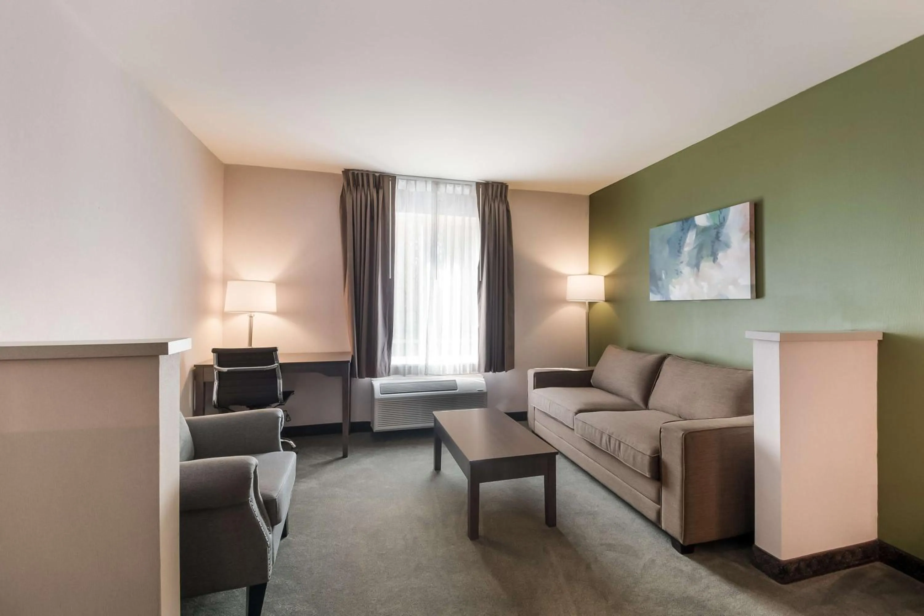 Bedroom in SureStay Plus Hotel by Best Western SeaTac Airport