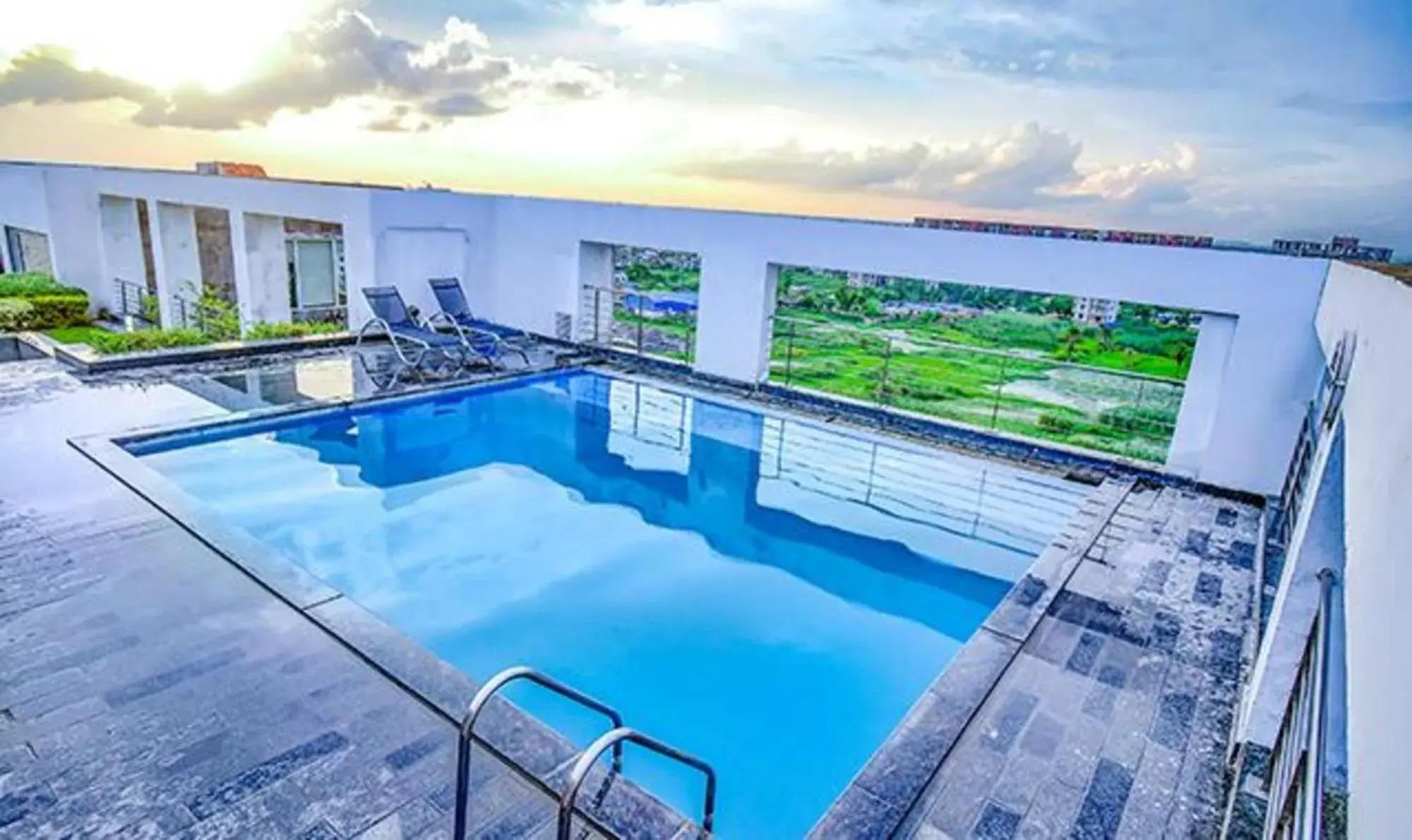 Swimming pool in FabHotel Prime Indeedcare Hotel & Resorts - Nr Kolkata Airport Swimming pool in FabHotel Prime Indeedcare Hotel & Resorts - Nr Kolkata Airport