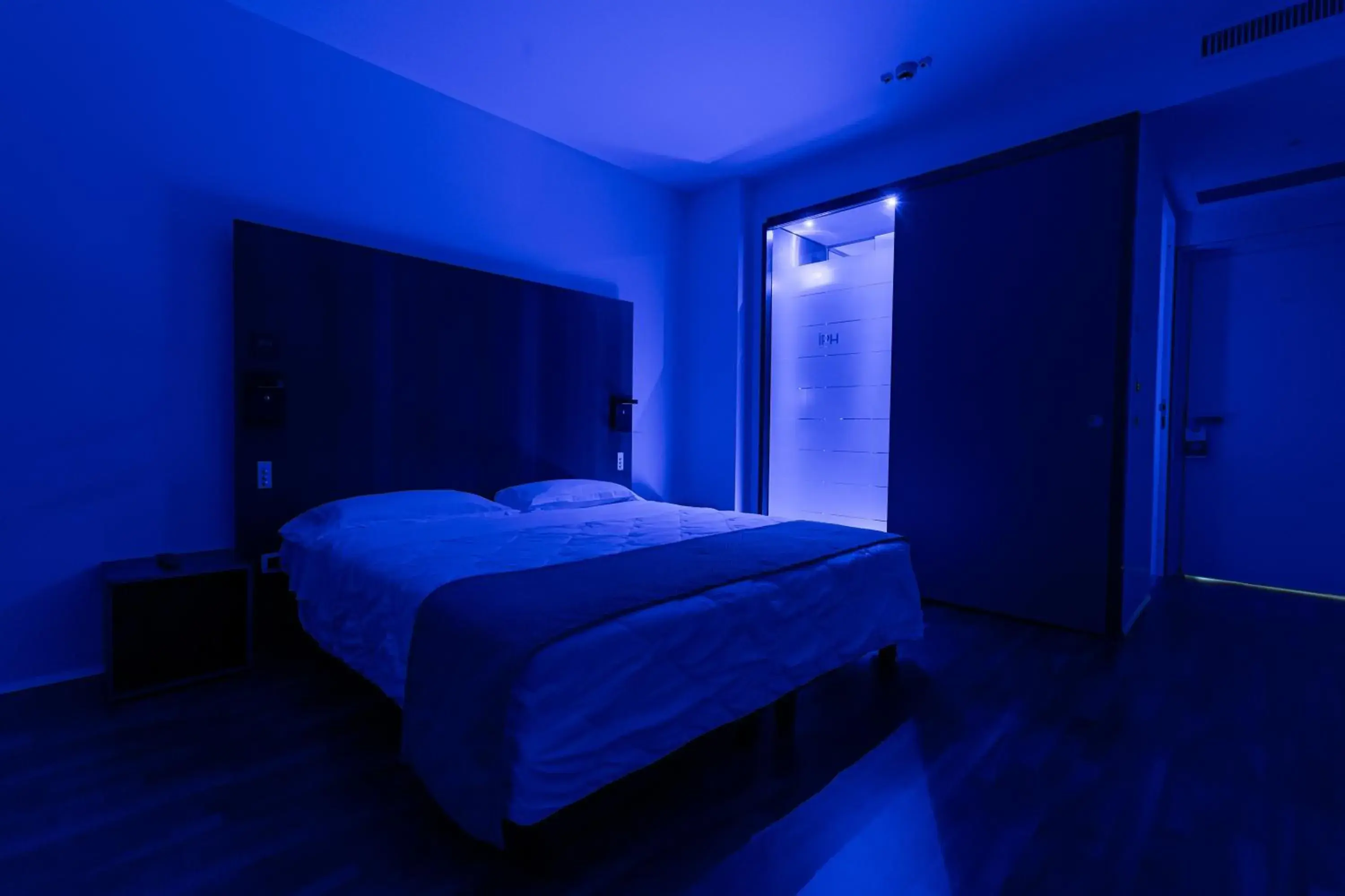 Bed in NEW IPOINT HOTEL Bed in NEW IPOINT HOTEL