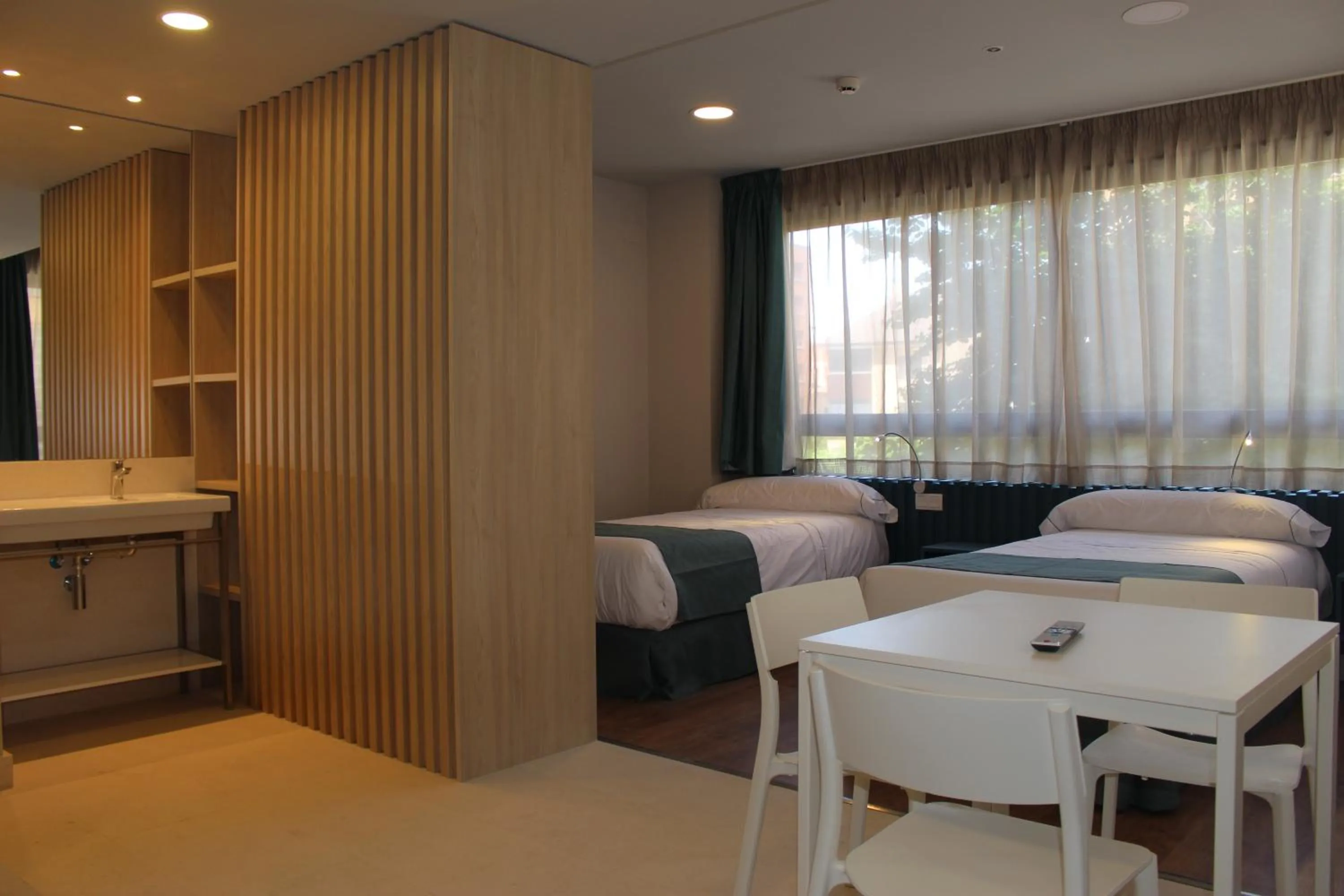 Dining area, Bed in Modo Hotel Apartamento