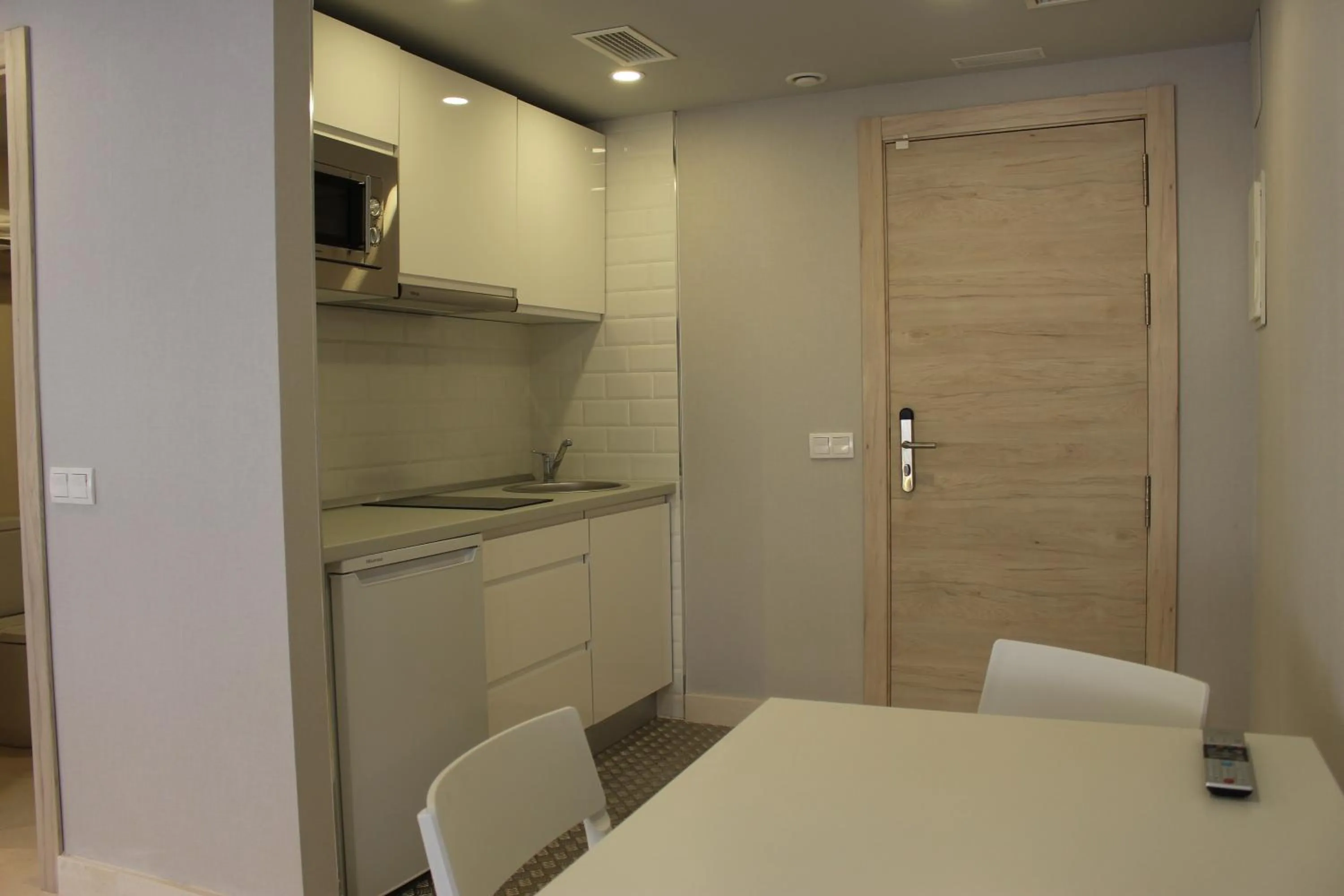 Kitchen or kitchenette in Modo Hotel Apartamento