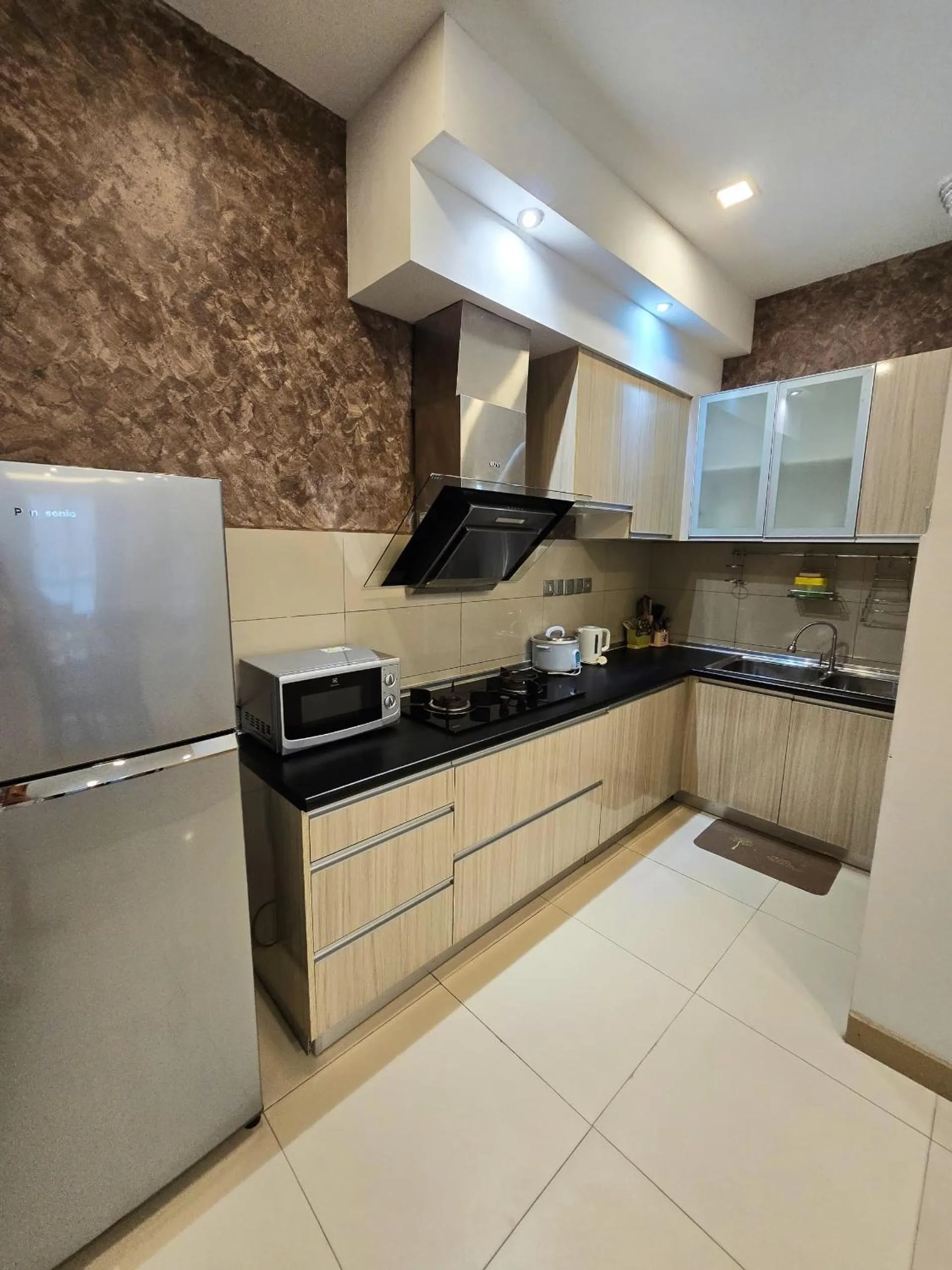 Kitchen or kitchenette in Mari Mari Homestay - IMAGO THE LOFT