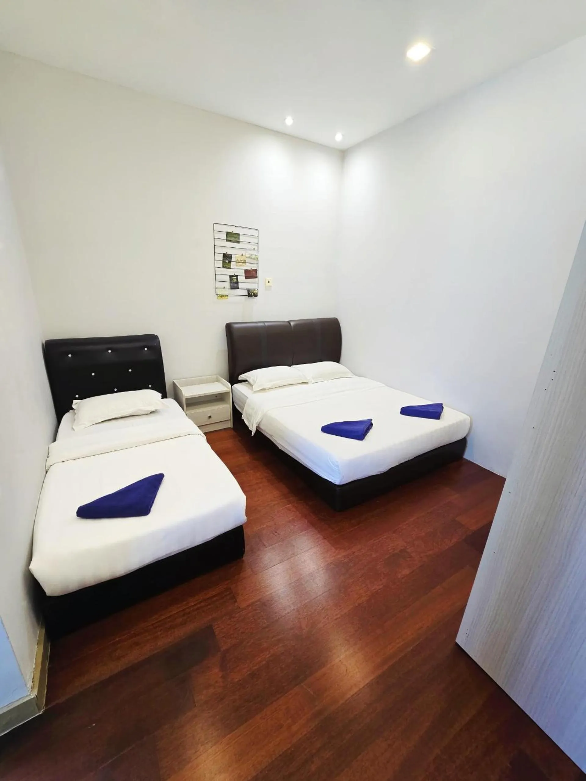 Bed in Mari Mari Homestay - IMAGO THE LOFT